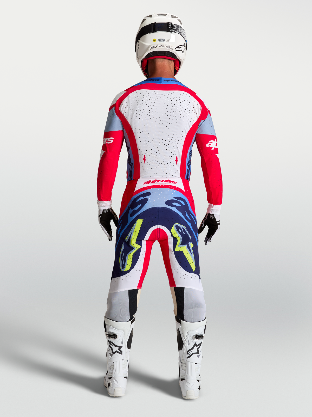 Alpinestars Supertech Dyna Jersey AND 2027 Supertech Dyna Gear Set, Men's Motocross Outfit in Fire Red and White, rear view.