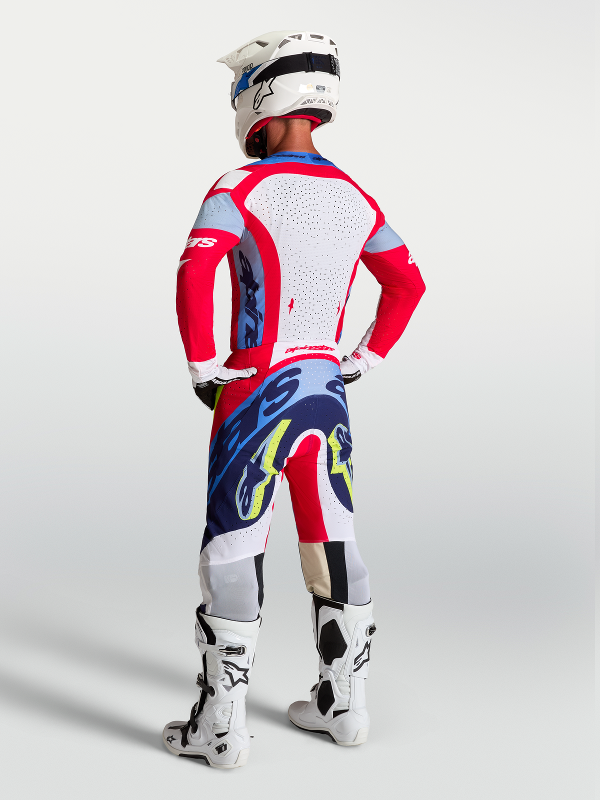 Alpinestars Supertech Dyna Jersey in Fire Red and Navy Blue, Men's Motocross Gear with laser-cut back panels.