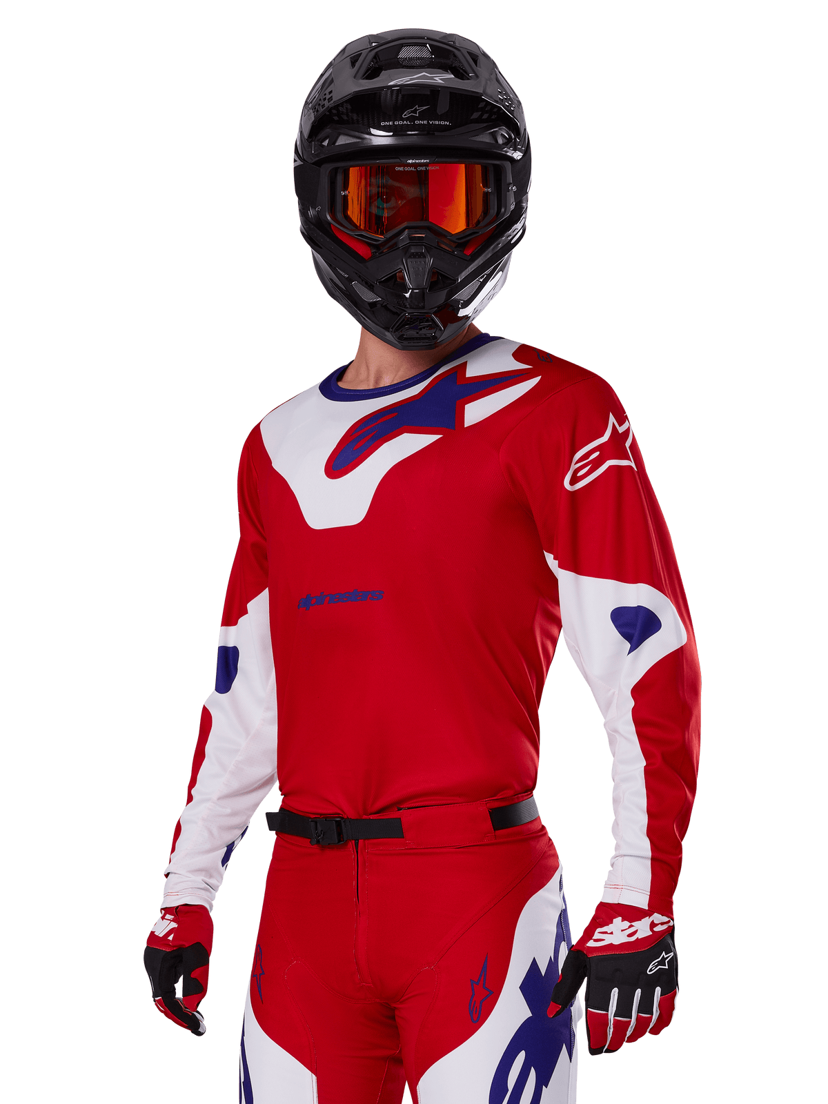 Alpinestars 2025 Racer Veil Gear Set, motocrosskører iført rød, hvid og blå racingtrøje og bukser, sort hjelm med orange goggles med spejlglas, røde og hvide handsker, højtydende off-road udstyr med markant branding