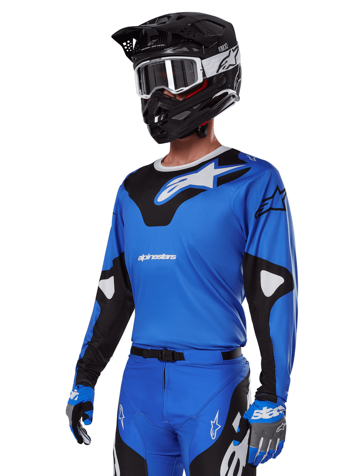 Alpinestars 2025 Racer Veil-udstyrssæt, blå motocross-jersey med sort og hvid grafik, båret med matchende bukser, sort hjelm, hvide goggles og blå handsker, teknisk beklædning til off-road racing