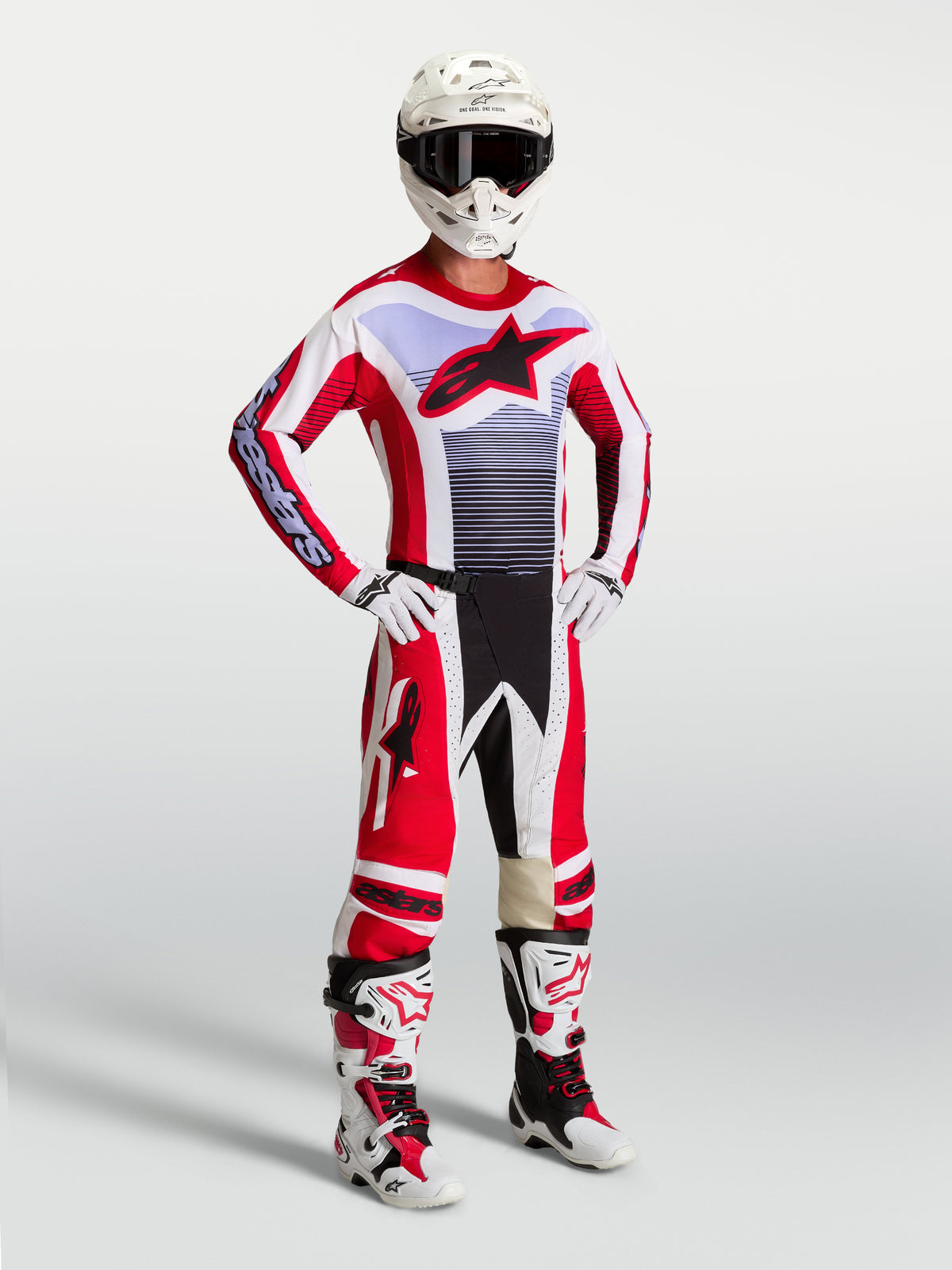 Alpinestars Techstar Maven gear-sæt til herrer, rød og hvid motocross-trøje og bukser med lilla detaljer.