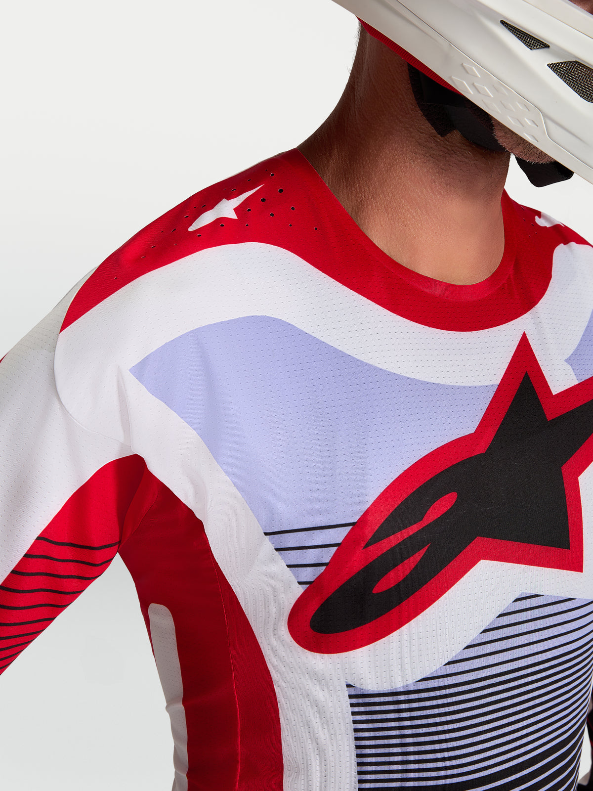 Alpinestars Techstar Maven trøje, rød og lilla motocrossracetrøje med laserskåret ventilation og atletisk race-fit.