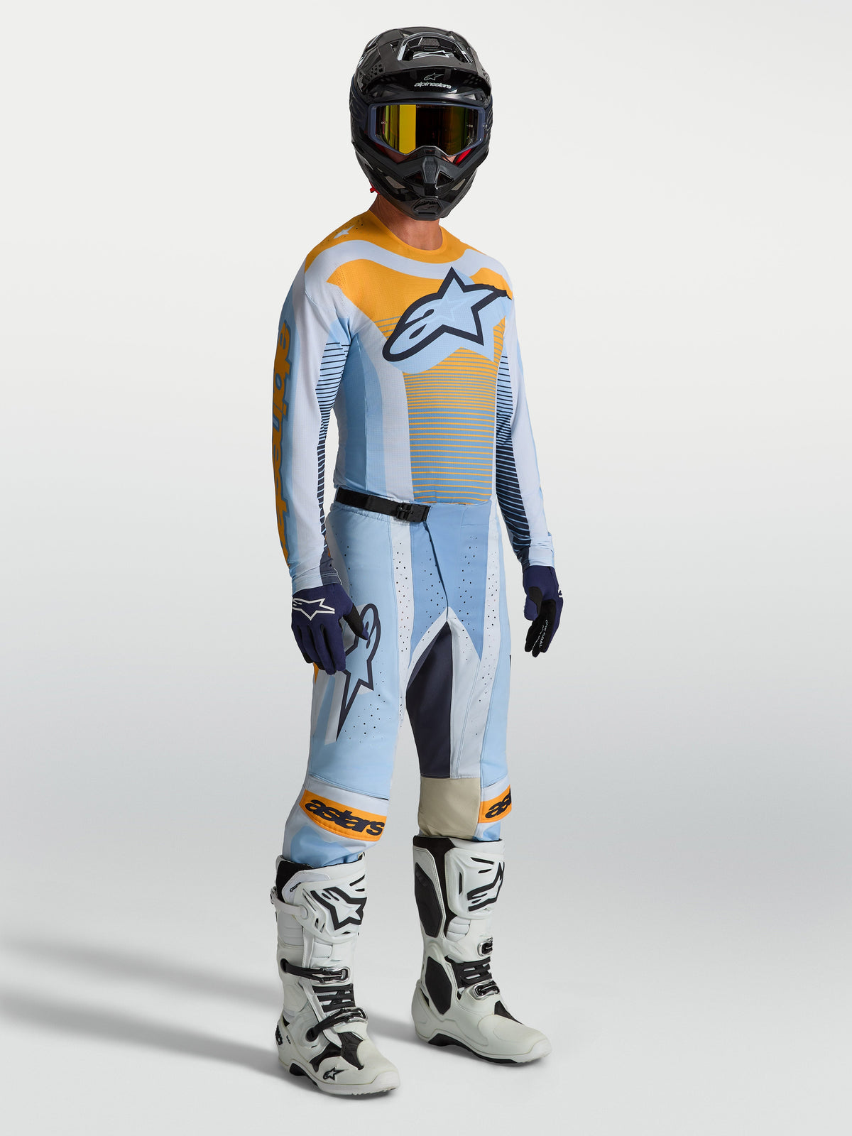 Alpinestars Techstar Maven udstyrssæt, herre motocrossudstyr i støvet blå og orange, atletisk race-fit design.