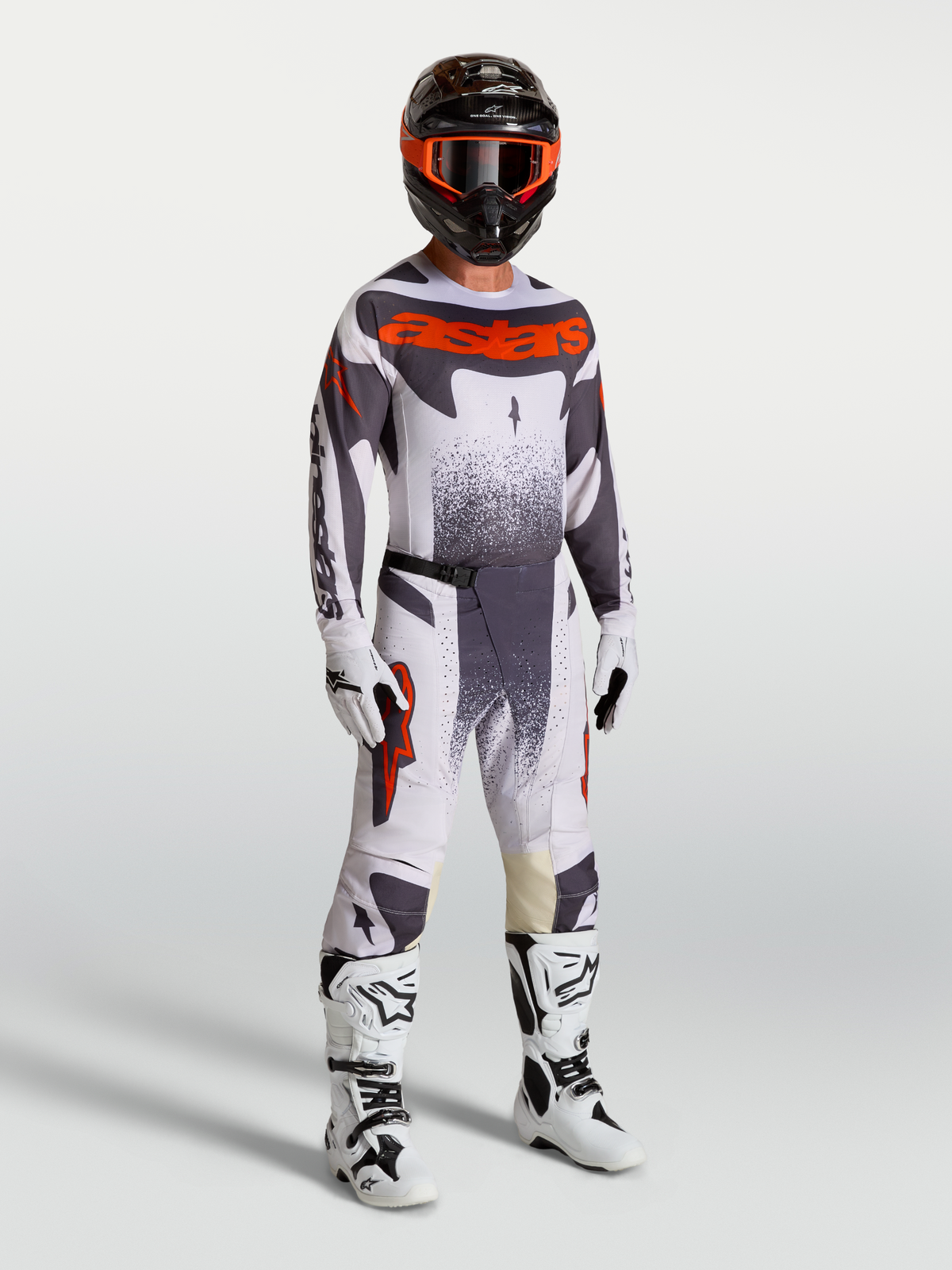 Alpinestars Techstar Swan trøje og udstyrssæt, herre-motocrossudstyr i lyslilla og grå med rød fluo.