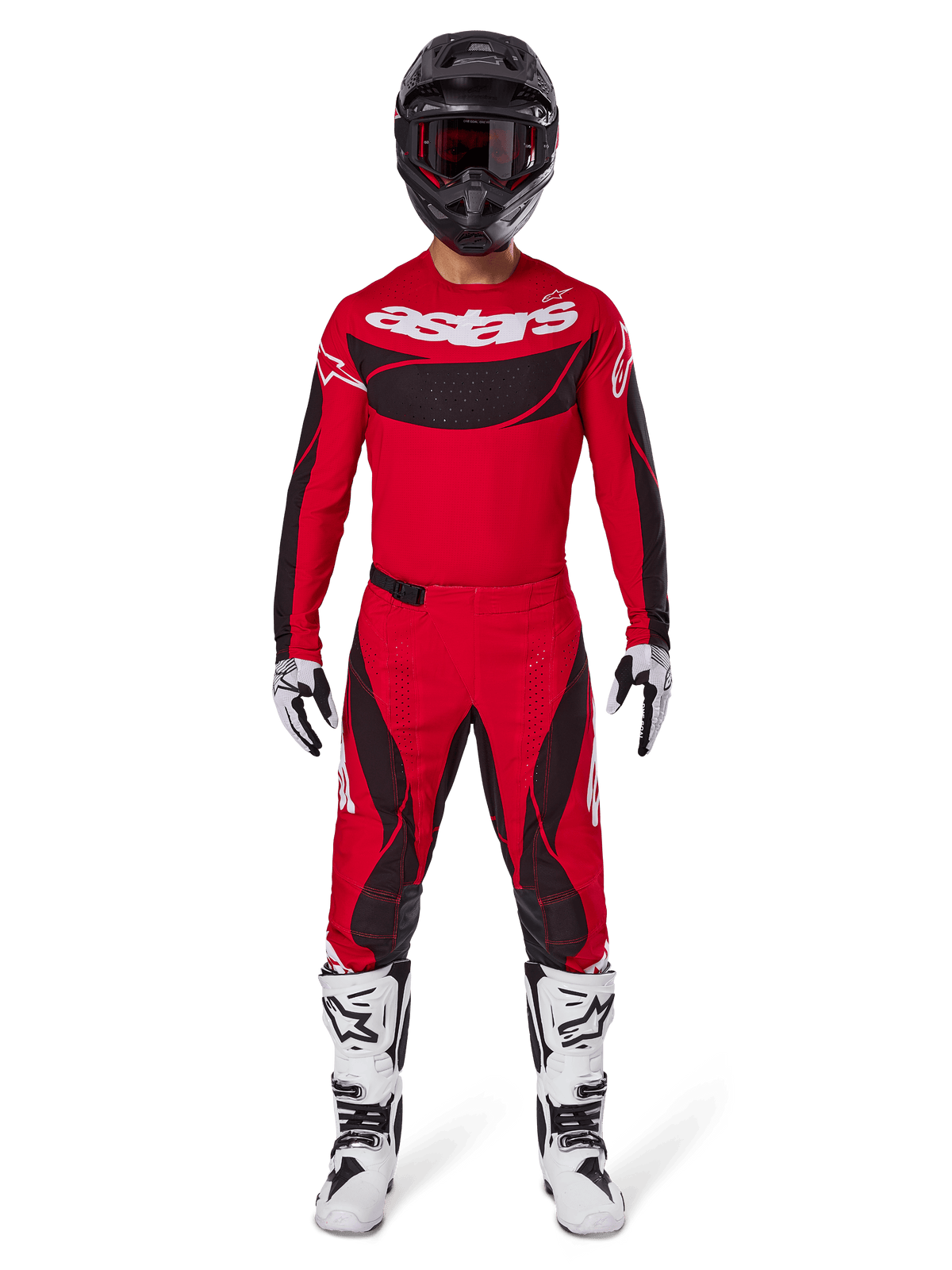 Motocross rider wearing the Alpinestars 2025 Techstar Dreem Gear Set, Bright Red jersey with black panels and white 'astars' branding, matching red and black pants, black helmet, white and black boots and gloves, complete outfit for off-road competition