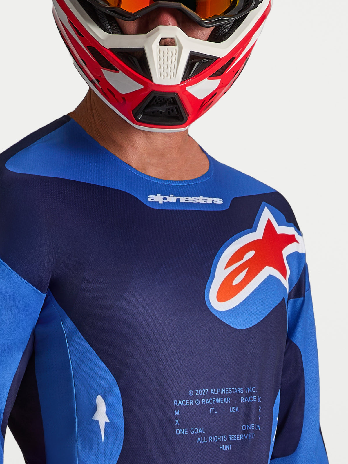 Alpinestars Racer Hunt trøje, motocrosstrøje til mænd, blå og rød, ergonomisk pasform med stort Astars-logo på brystet.