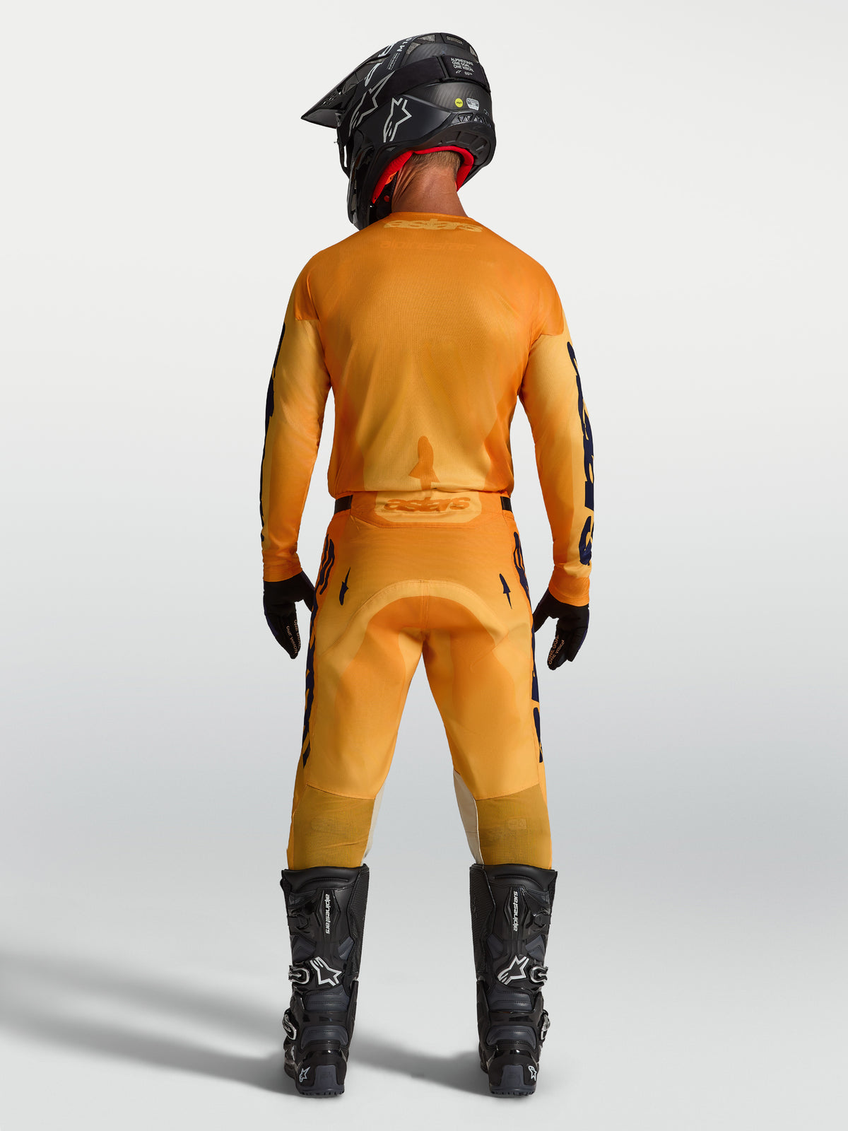 Alpinestars 2027 Racer Amber Jersey and Gear Set, Men's Motocross Outfit, Orange and Deep Blue, full back view.