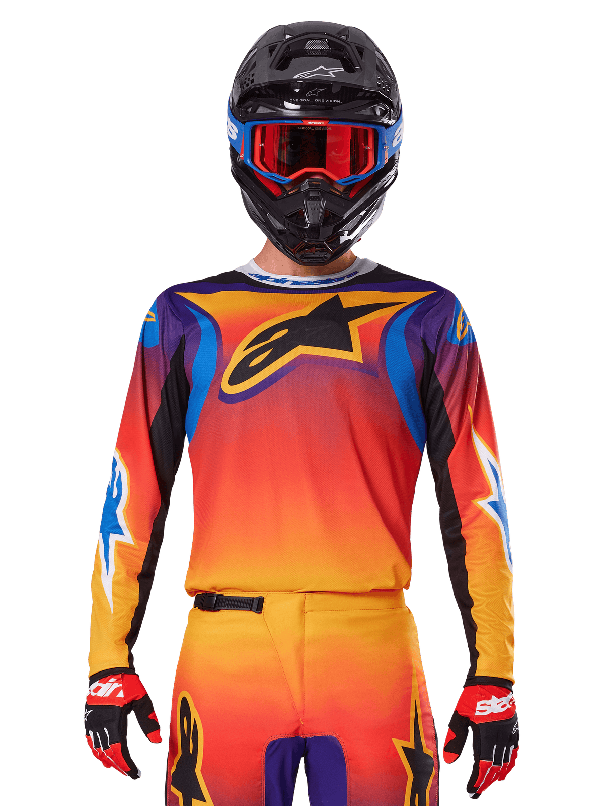Alpinestars 2025 Fluid Wurx trøje, multicolor motocross-trøje med orange og rød farveovergang og lilla detaljer, vist med matchende udstyr, sort hjelm med blå og røde goggles og røde handsker, med et stort sort stjernelogo på brystet.