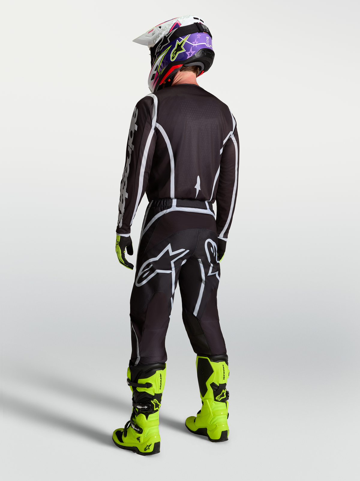 Alpinestars Fluid Apex V2 Jersey, Men's Black and Silver Motocross Jersey, performance fit shown from the back.