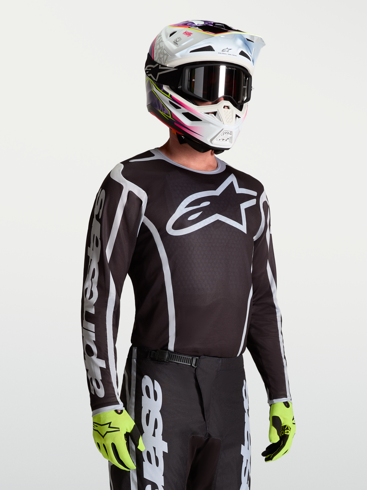 Alpinestars Fluid Apex V2 Jersey, Men's Motocross Jersey, Black and Silver, breathable moisture-wicking polyfabric.