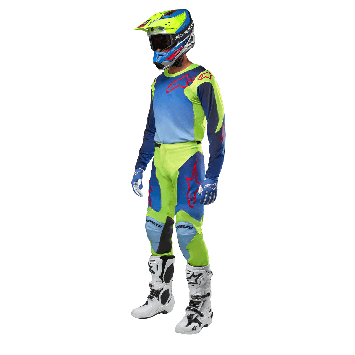 Alpinestars 2024 Racer Hoen trøje, motocross-trøje, gul fluo og mørkeblå, båret af en kører med matchende bukser, hjelm og hvide støvler, professionelt racerudstyr til terrænkørsel