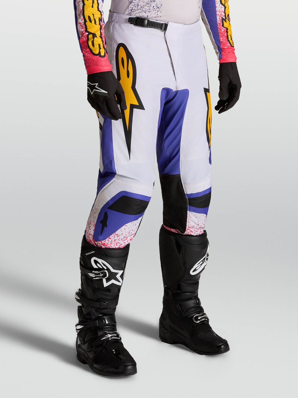 Alpinestars Fluid Drag Pants, Motocross Riding Pants for men, Blue and Light Lilac with Gold graphics, ergonomic sport fit design.