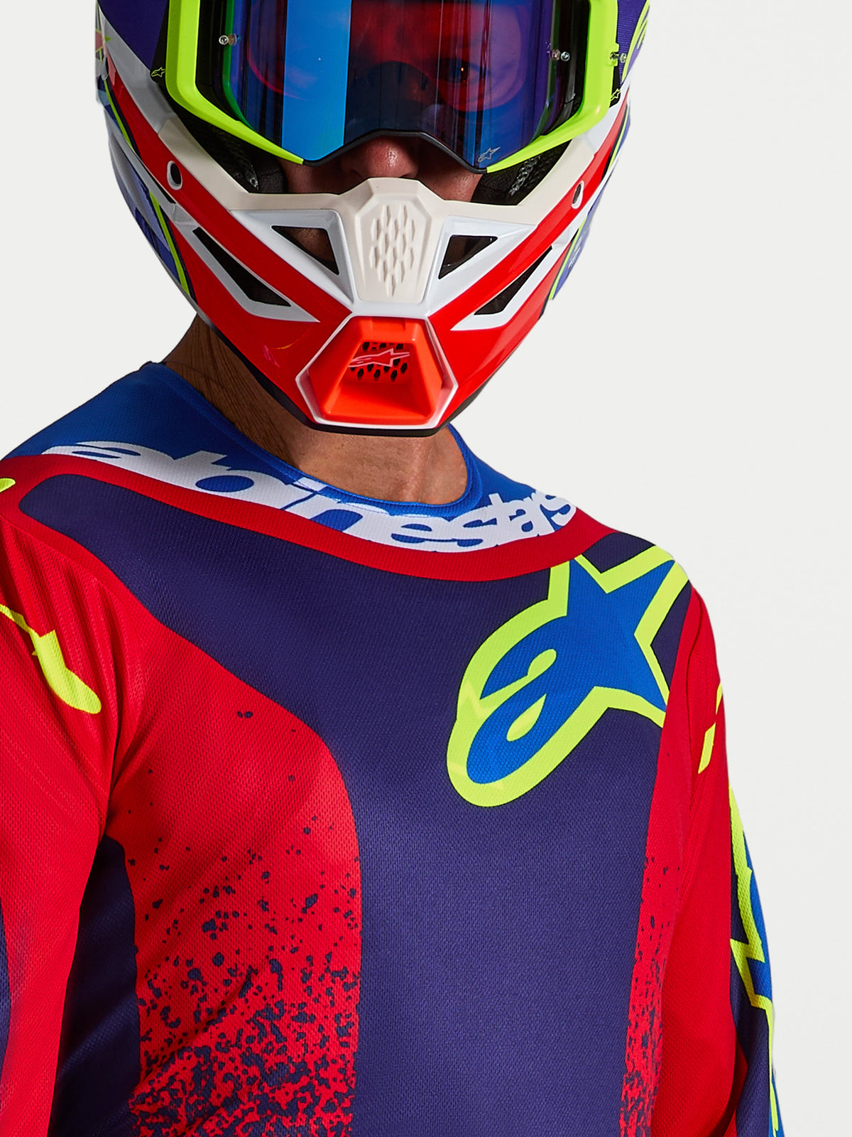 Alpinestars Fluid Drag trøje, herre-motocrosstrøje i mørkeblå og rød, med brystlogo og sportskrave til off-road kørsel.