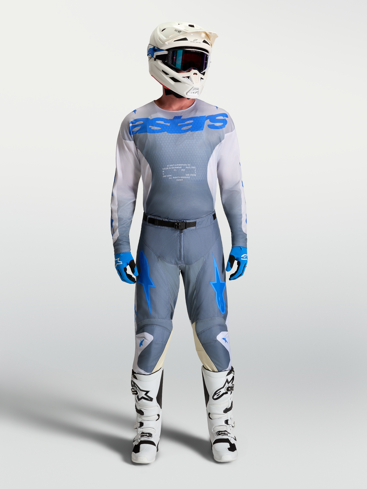 Alpinestars Racer Amber Pants and Jersey, Men's Motocross Gear Set, Ash Gray and UCLA Blue, white boots and helmet.