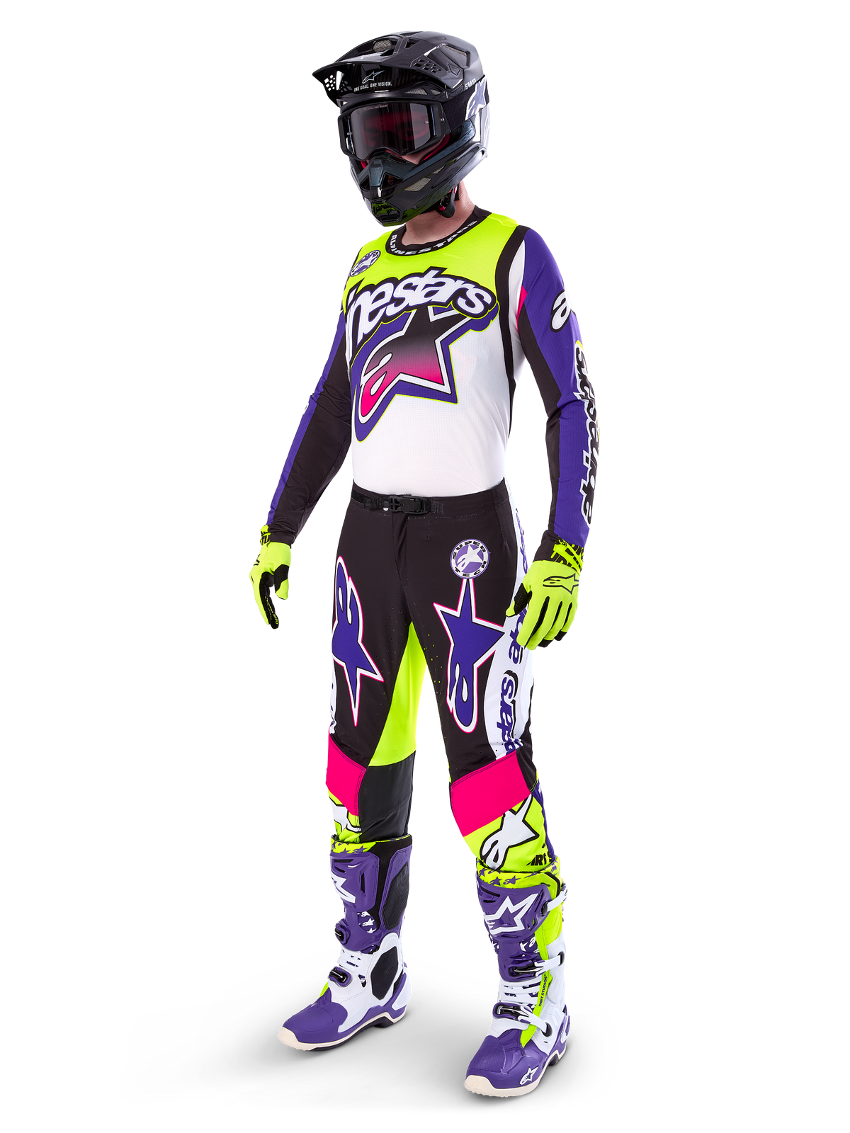 Motocross-kører i Alpinestars Limited Edition Supertech Dirt Studios® udstyr, hvid, lilla og neon-gul farvekombination, sorte bukser med markante lilla og lyserøde stjerne-logoer, neon-gule handsker, lilla og hvide racingstøvler, sort hjelm, komplet professionelt racersæt til terrænkørsel