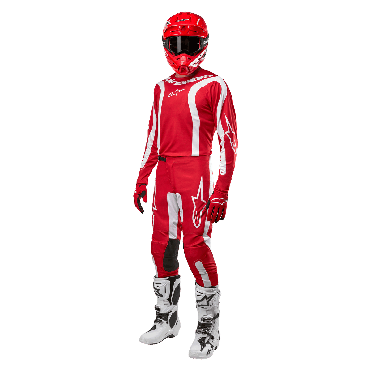 Motocrossrytter iført komplet racerudstyr, Alpinestars 2024 Fluid Lurv trøje i Mars rød og hvid, matchende røde bukser med hvide detaljer, rød hjelm, røde handsker og hvide og sorte støvler, koordineret outfit til off-road kørsel