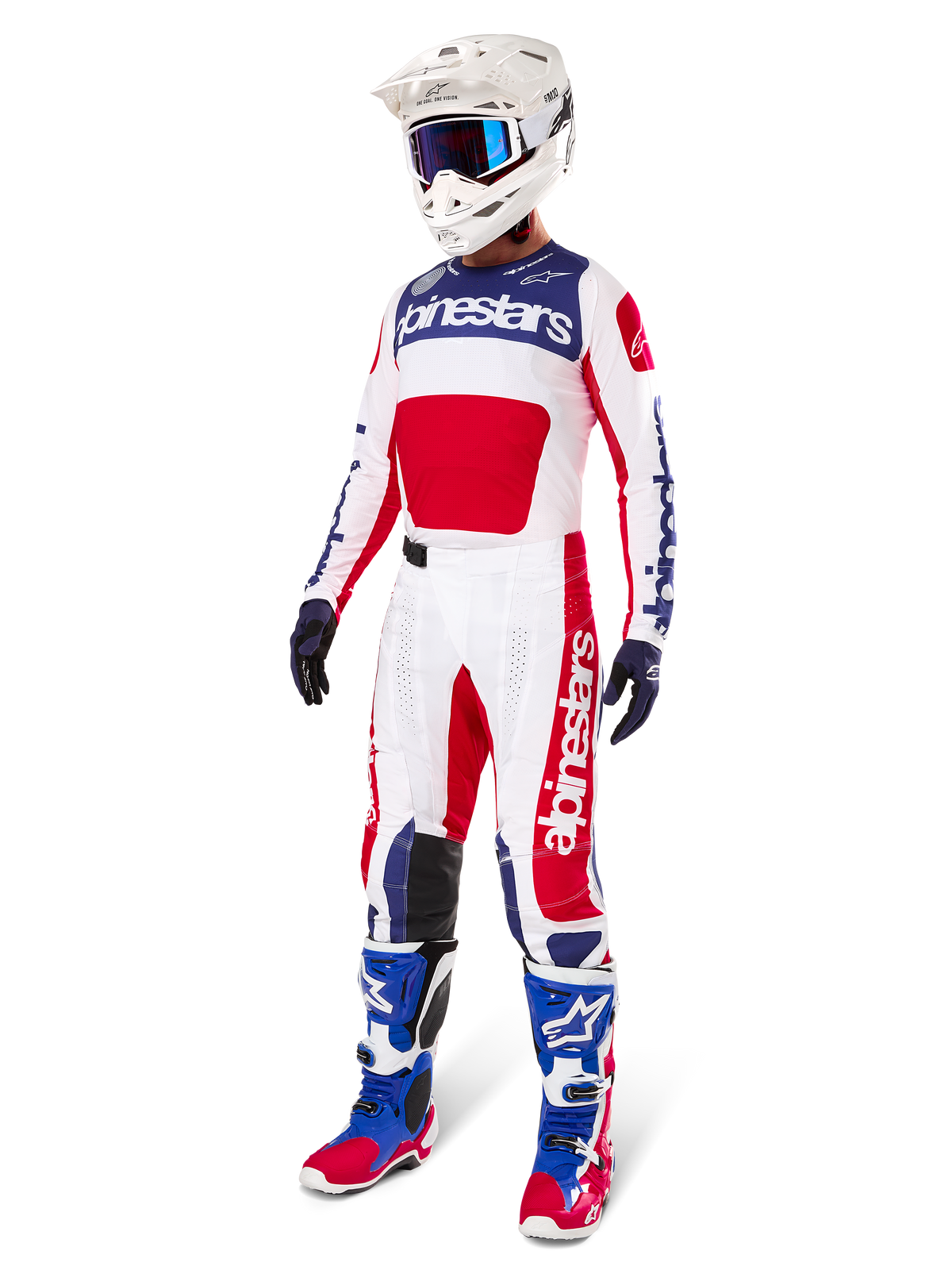 Alpinestars Limited Edition Techstar Fortitude Jersey, komplet motocross-udstyr, rød, hvid og blå, matchende motocross-bukser, hvid hjelm med blå briller og blå og røde støvler, koordineret look til terrænkørsel.