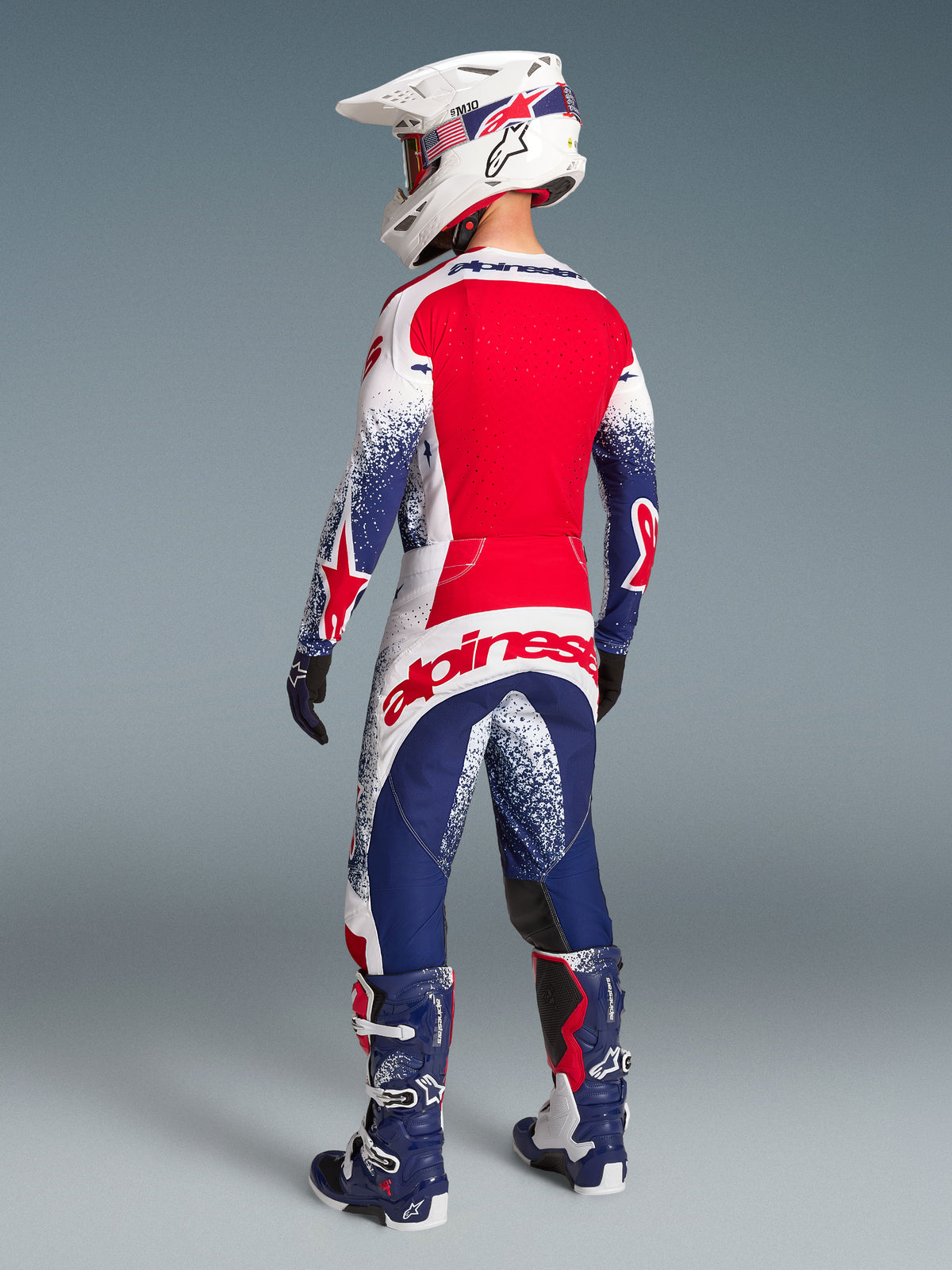 Alpinestars Limited Edition Techstar Unity Jersey, red white blue motocross gear, back view of ventilated racing fit.