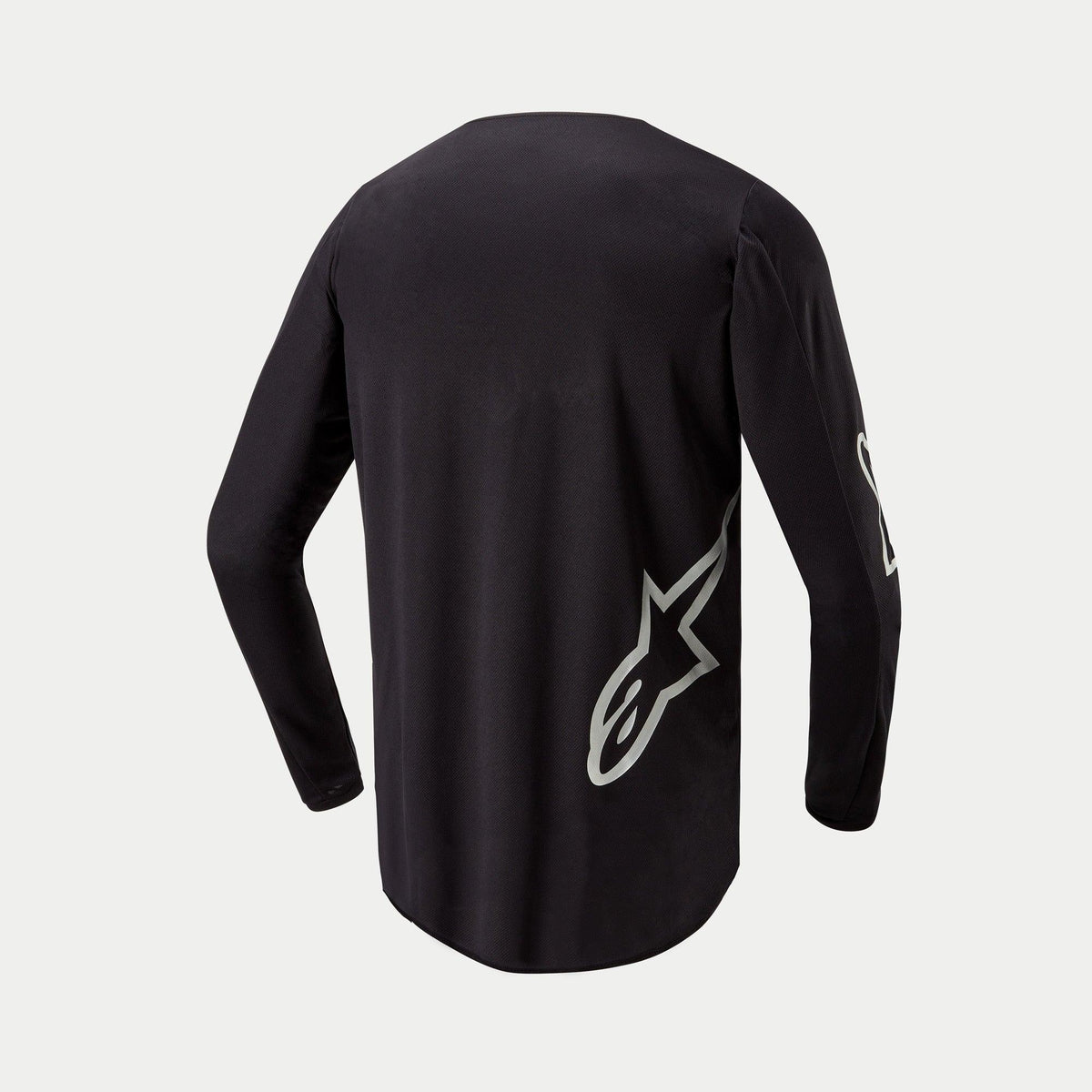 Alpinestars 2024 Fluid Graphite Jersey, motocross trøje, sort og sølv, set bagfra med et sølvfarvet stjernelogo på siden forneden, langærmet design med forlænget bagkant for dækning ved terrænkørsel