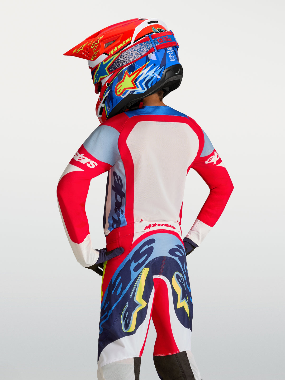 Alpinestars 2027 Trøje Supertech Dyna Ungdom, rød og mørkeblå motocrosstrøje i åndbart mesh, set bagfra