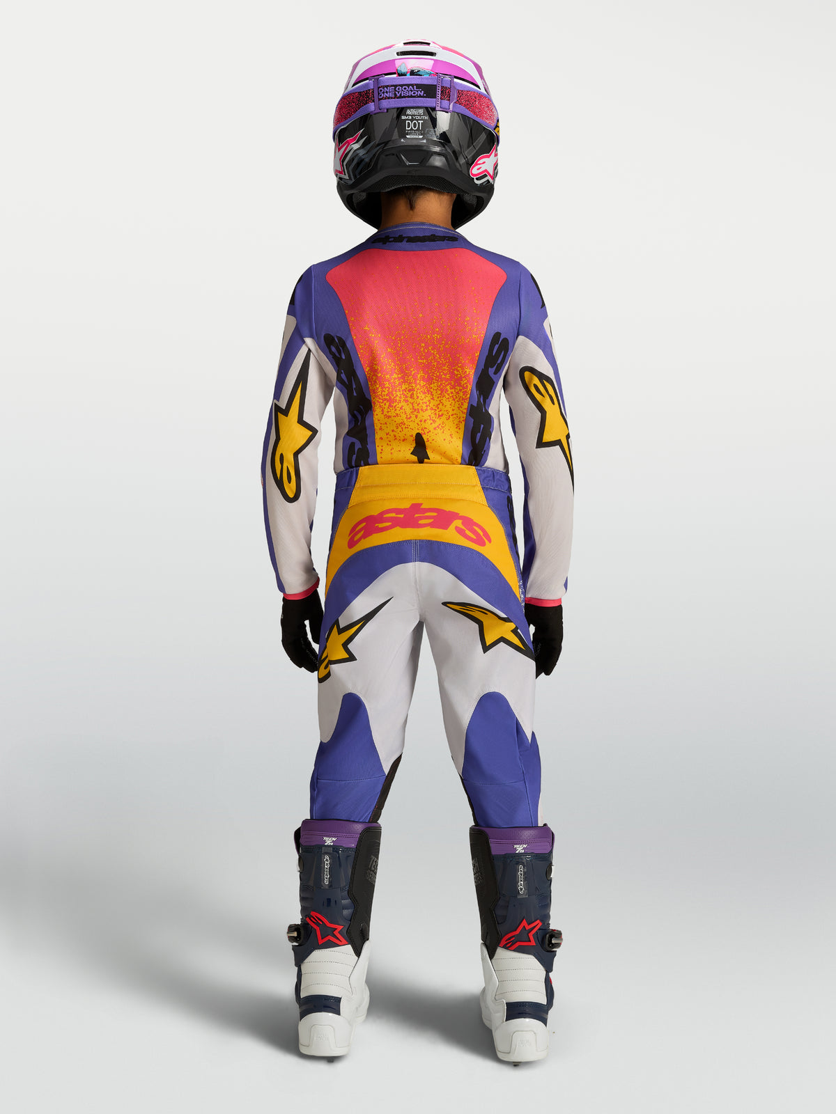 Alpinestars 2027 Fluid Drag trøje og udstyrssæt til ungdom, blå og guld, motocross-racerudstyr set bagfra.