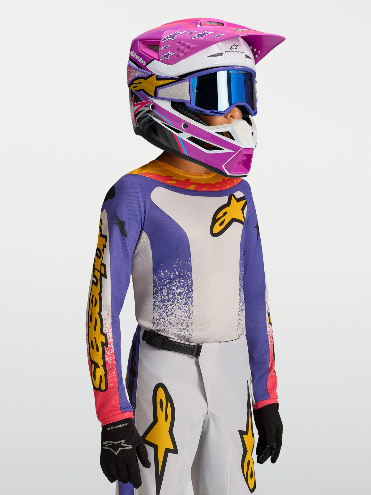 Alpinestars Youth Fluid Drag Jersey, blue and white motocross racing jersey for kids with yellow accents.