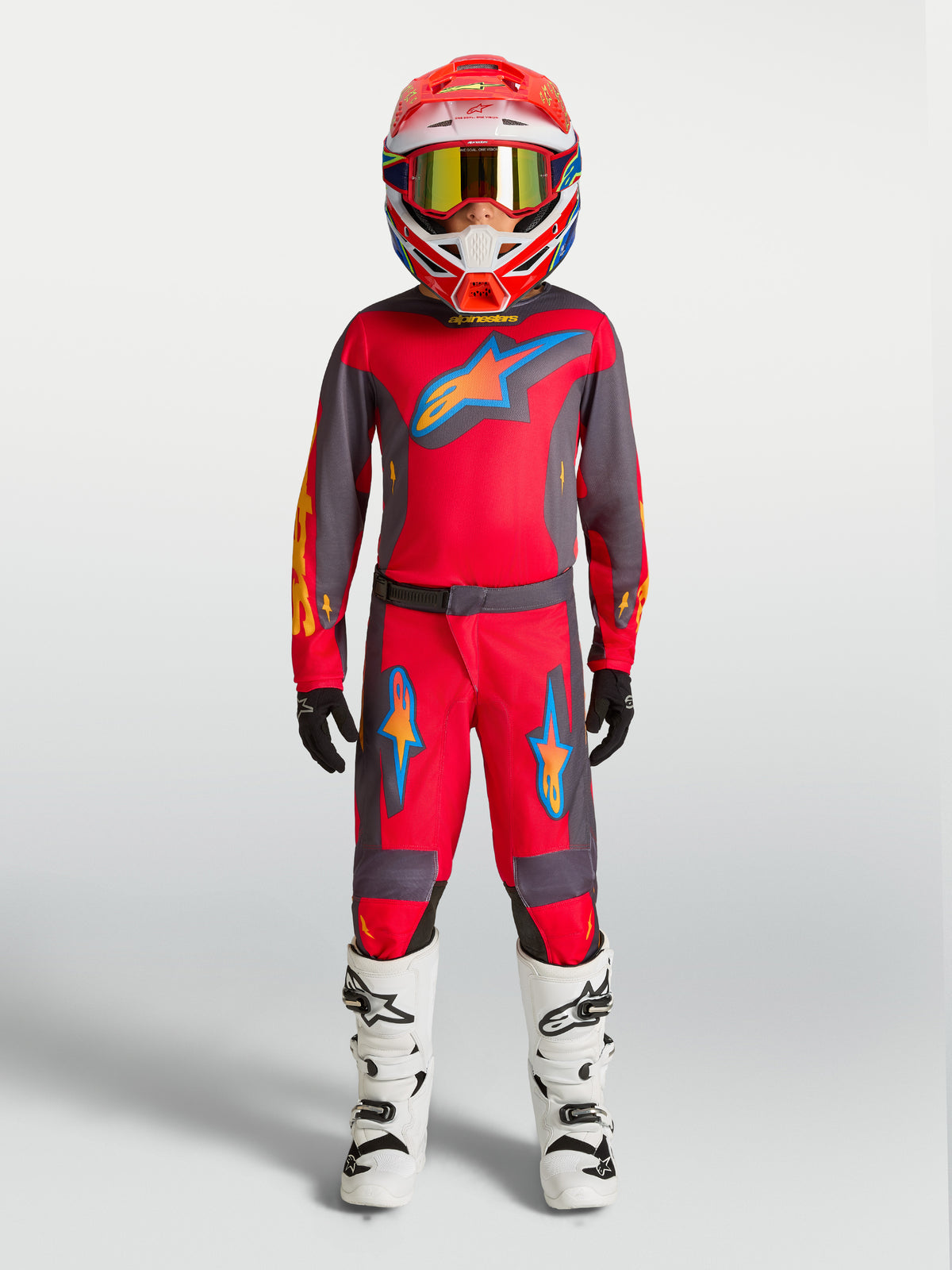Alpinestars 2027 Youth Fluid Hunt Jersey and Gear Set, red and graystone motocross racing outfit for kids on-model.
