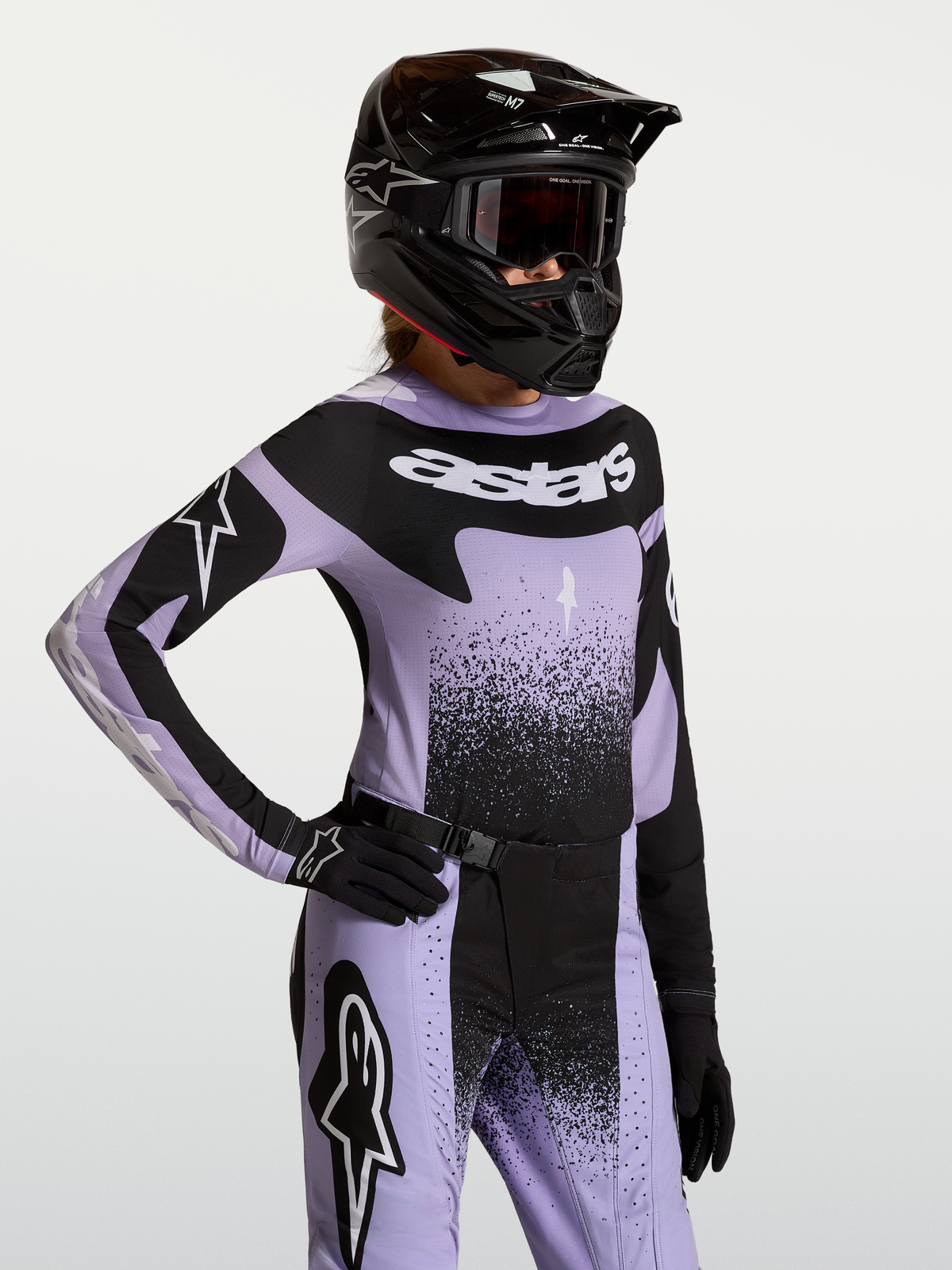 Stella Techstar Swan trøje, dame-motocrosstrøje i lilla og sort, atletisk race-pasform med Astars-logo og åndbart design