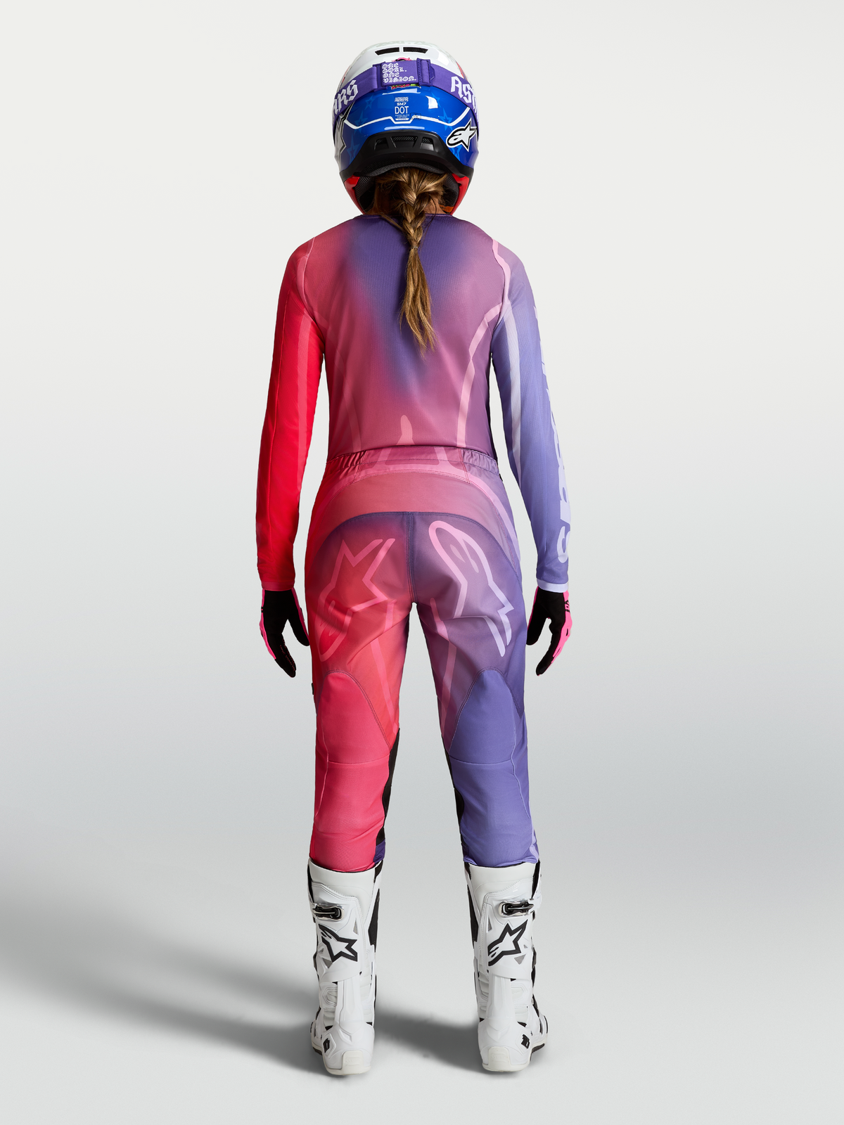 Alpinestars Stella Fluid Kepler Bukser og Udstyrssæt, motocrossudstyr til damer i lilla og rød set bagfra.