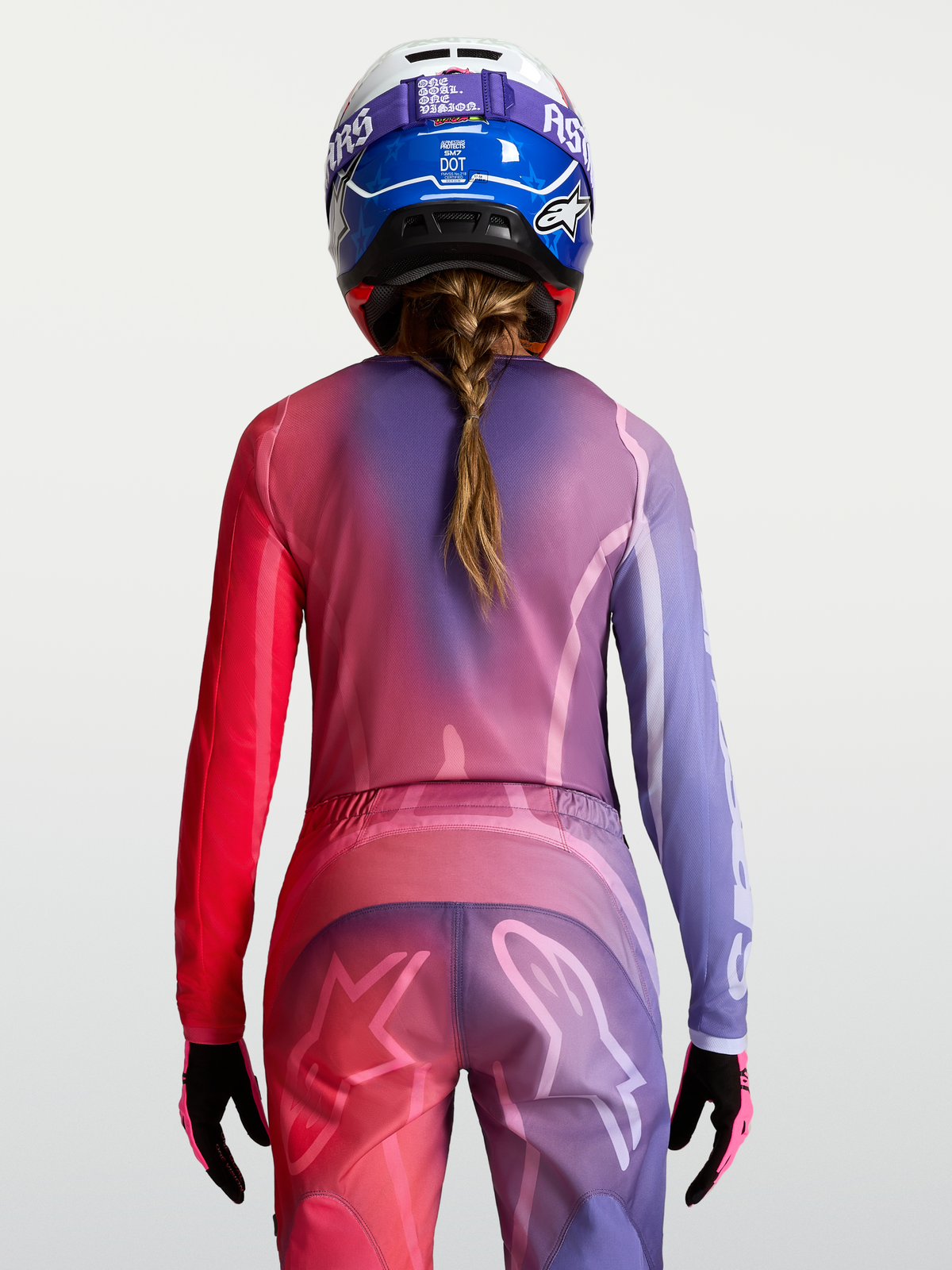 Alpinestars Stella Fluid Kepler trøje, dame-motocrosstrøje i lilla og rød, fugttransporterende poly-stof, set bagfra.