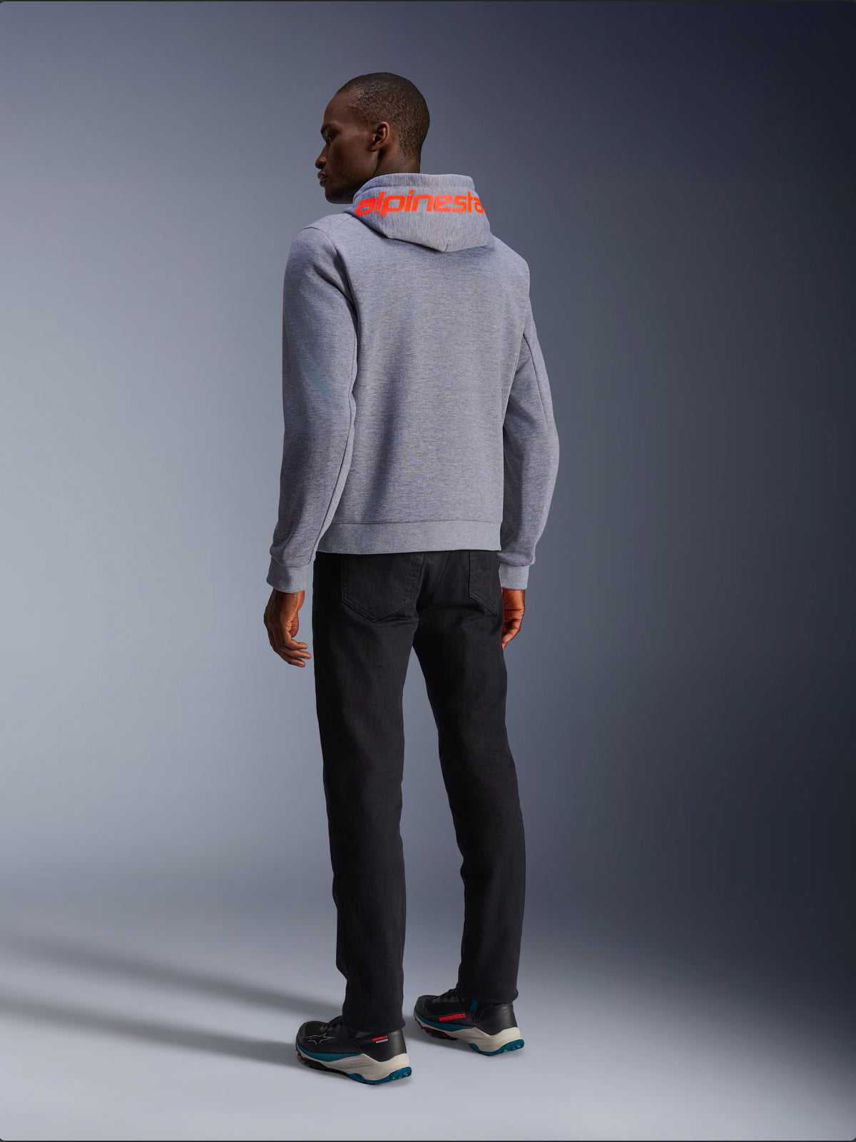 Alpinestars Chrome V2 Sport Hoodie in Gray Heather and Red Fluo, urban motorcycle textile jacket, back view on model.