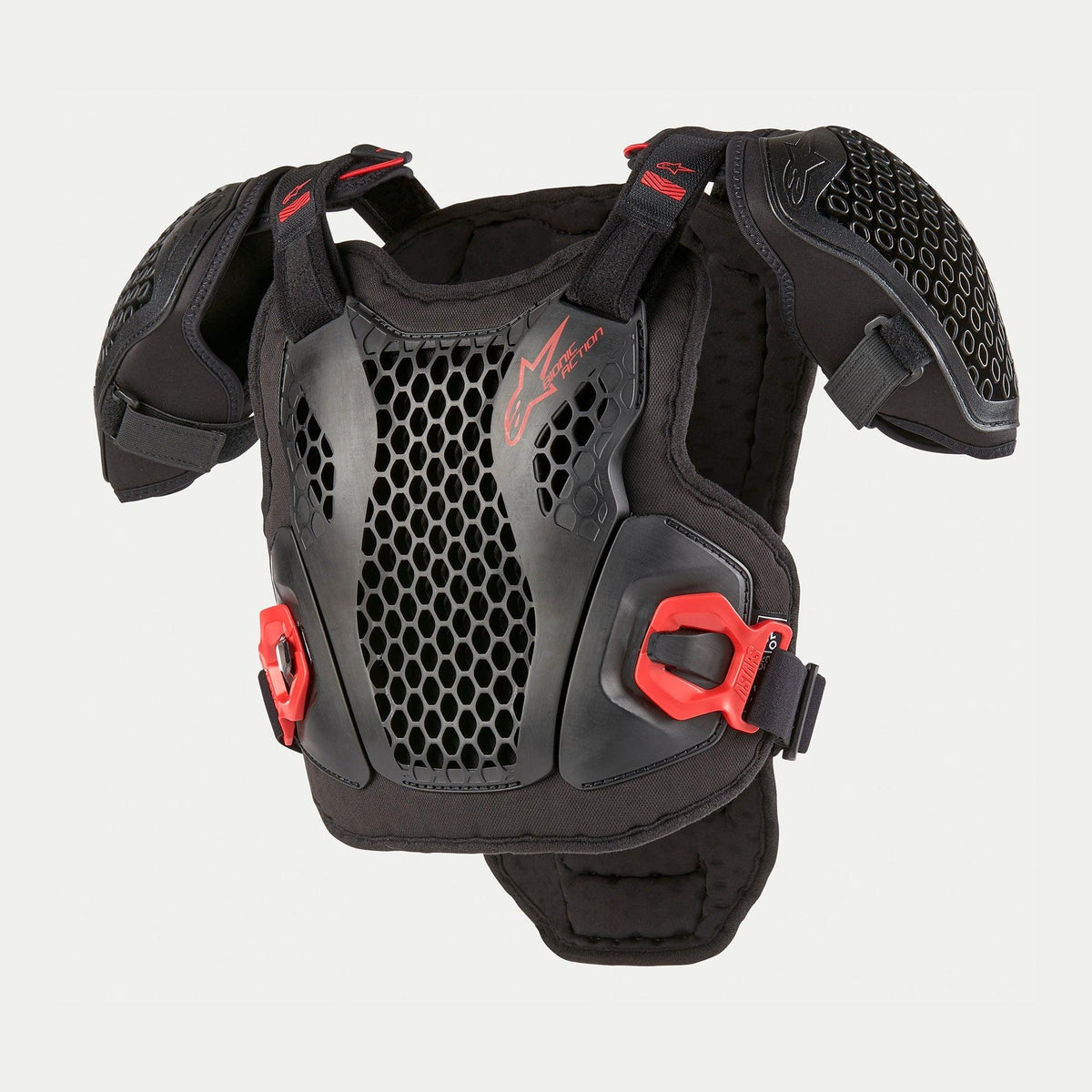 Alpinestars Youth Bionic Action brystbeskytter, motocross kropsbeskyttelse, sort og rød, med perforerede Cell Technology-gitterplader, justerbare skulderstropper, røde hurtigspænder og polstret chassis til off-road kørsel for unge