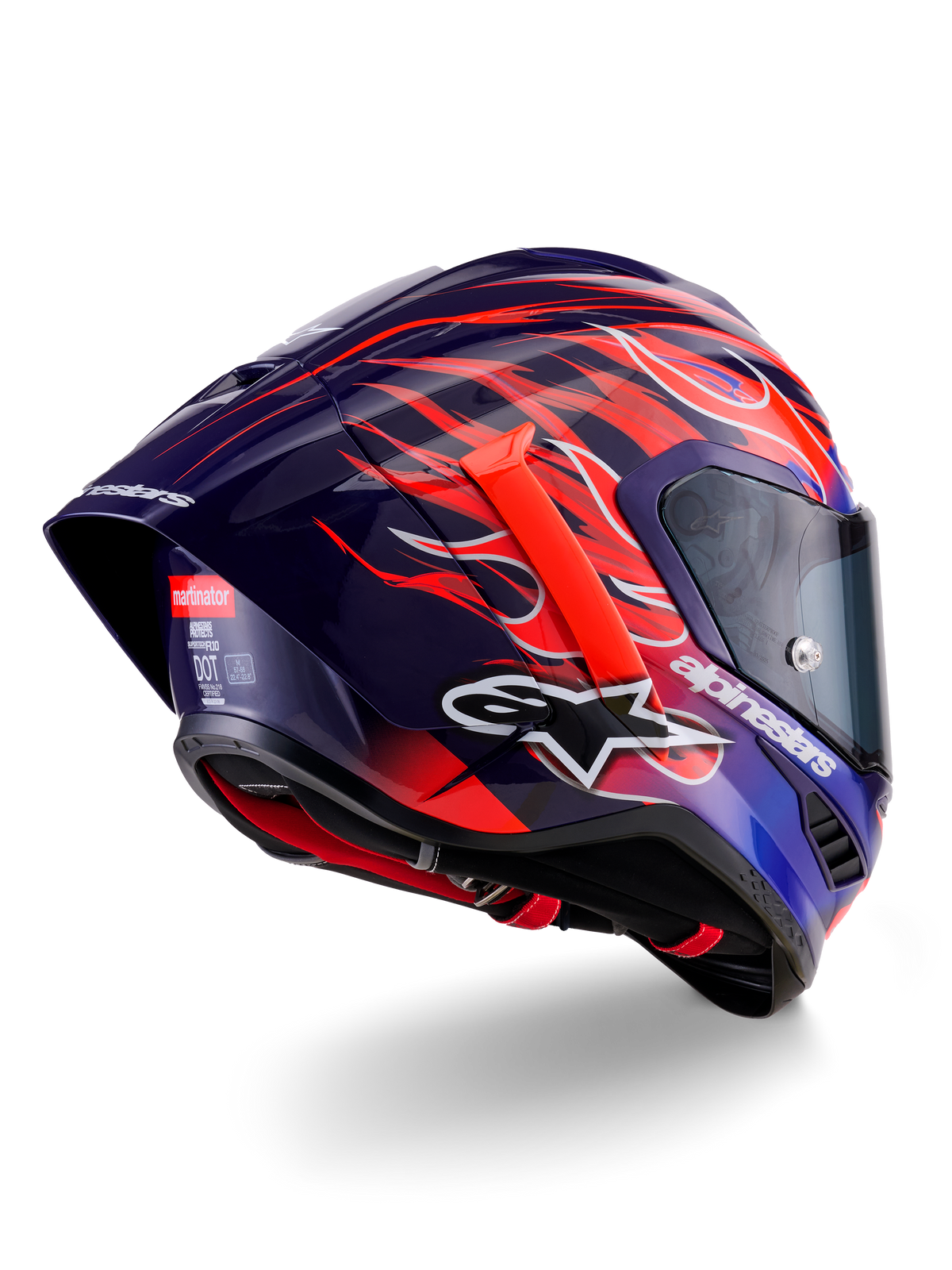 Alpinestars Supertech R10 Limited Edition Flyte Hjelm, full-face racinghjelm, blank dyb lilla og blå med orange og røde flamme-grafikker, med hvidt Alpinestars-logo og aerodynamisk bagspoiler, højtydende hovedbeskyttelse til motorsport