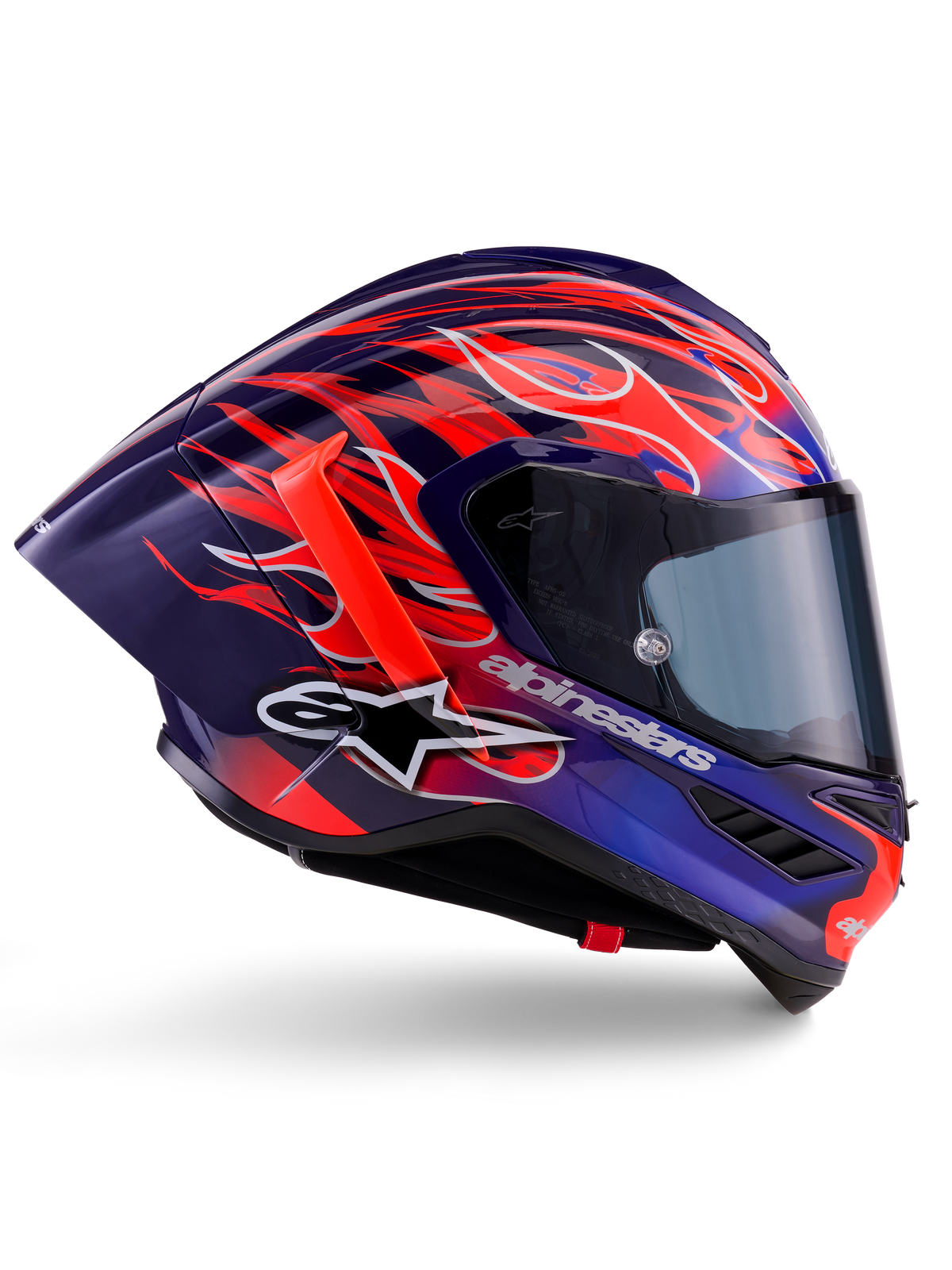 Alpinestars Supertech R10 Limited Edition Flyte-hjelm, Purple Red Glossy, full-face motorcykelhjelm med mørkeblå og lilla base og iøjnefaldende orange og røde flammemotiver, aerodynamisk profil med rød bagspoiler og mørkt visir, professionelt racerudstyr