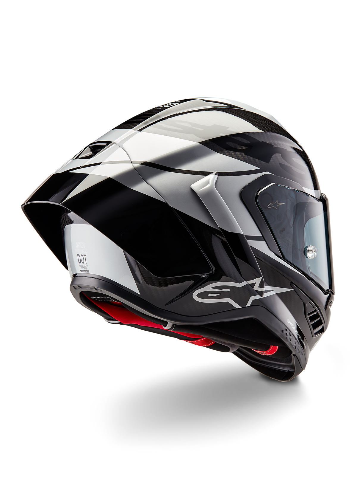 Alpinestars Supertech R10 Element-hjelm, Black Carbon Silver Black Glossy, trekvart visning bagfra som viser den aerodynamiske racerprofil, blank kulfiberskal med geometrisk grå og sort grafik, Alpinestars-logo og rød indvendig polstring