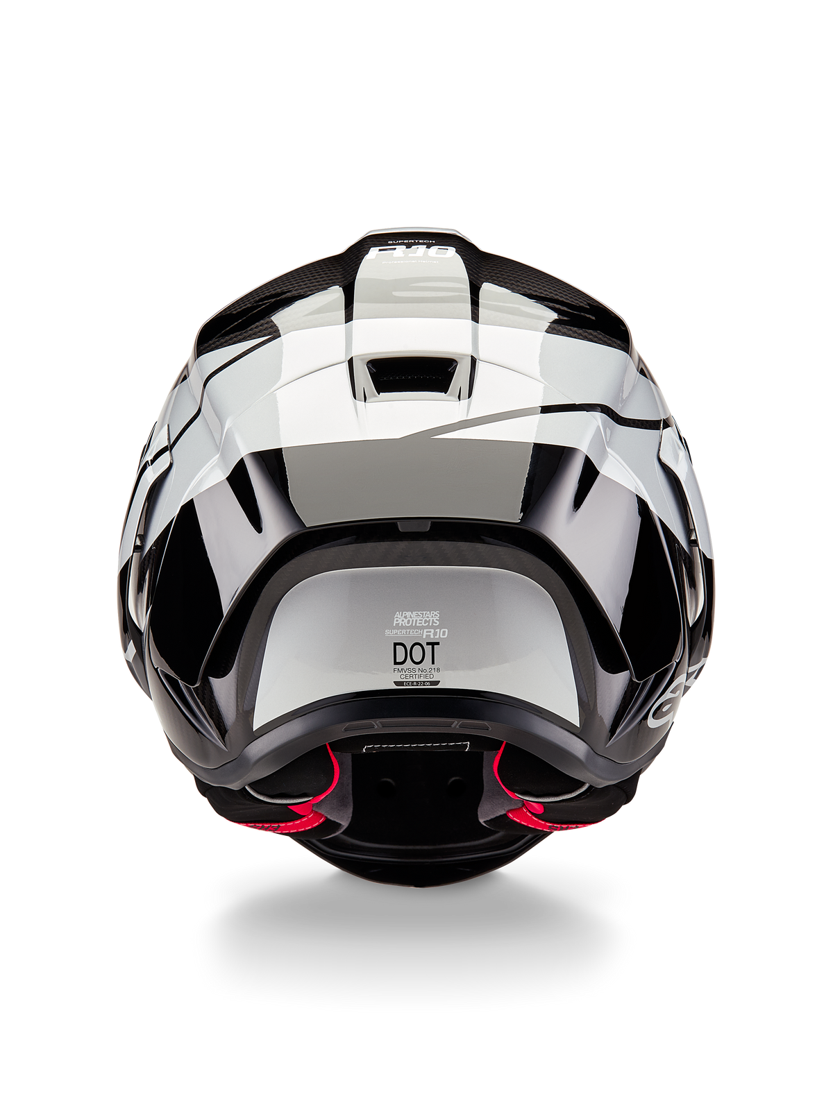 Alpinestars Supertech R10 Element hjelm, set bagfra, Black Carbon Silver Black Glossy, med aerodynamisk spoilerdesign, DOT-certificeringsmærke og røde detaljer på den indvendige polstring, professionel hovedbeskyttelse til racing