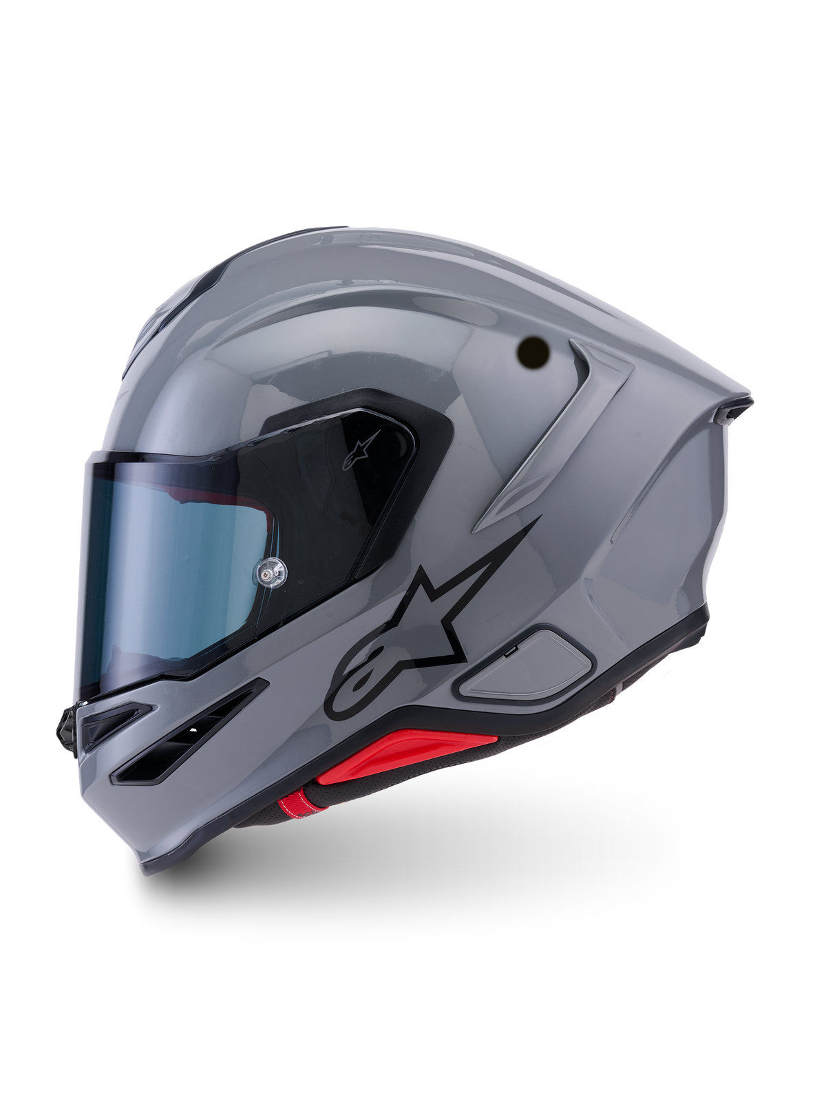 Alpinestars S-R7 Solid hjelm, grå glansfuld motorcykelhjelm, sideprofil med sort Alpinestars A-star logo, tonet visir og aerodynamisk kulstofkompositskal