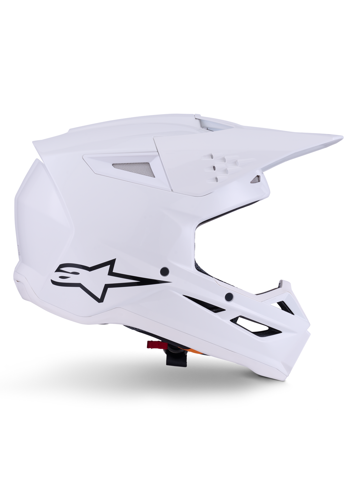 Alpinestars S-M3 Solid hjelm, motocross hjelm, blank hvid, sideprofil med sort stjernelogo, kantet aerodynamisk skal, flere ventilationsåbninger, integreret visir og hageværn, off-road racerbeskyttelse