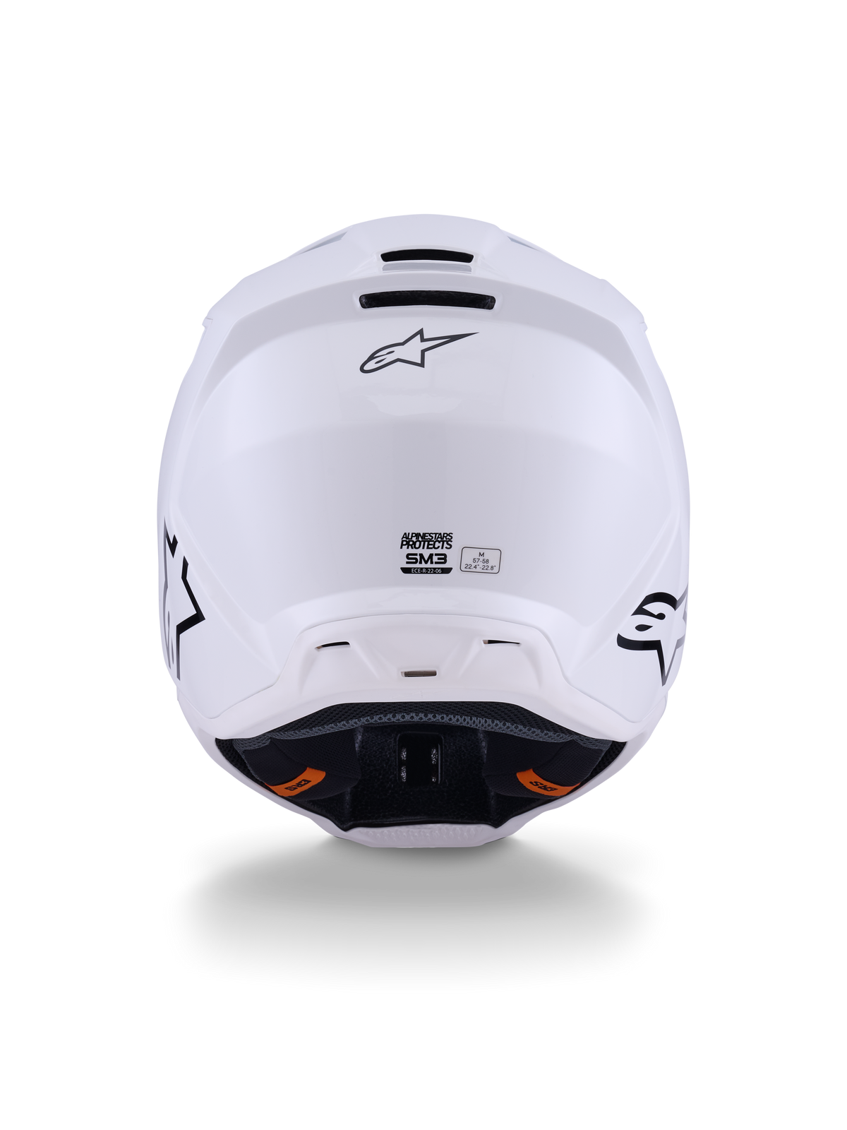 Alpinestars S-M3 Solid hjelm ECE 22.06, motocrosshjelm, hvid blank, set bagfra med udstødningsporte til ventilation, Alpinestars-logo og sikkerhedscertificeringslabel, designet til off-road ydeevne