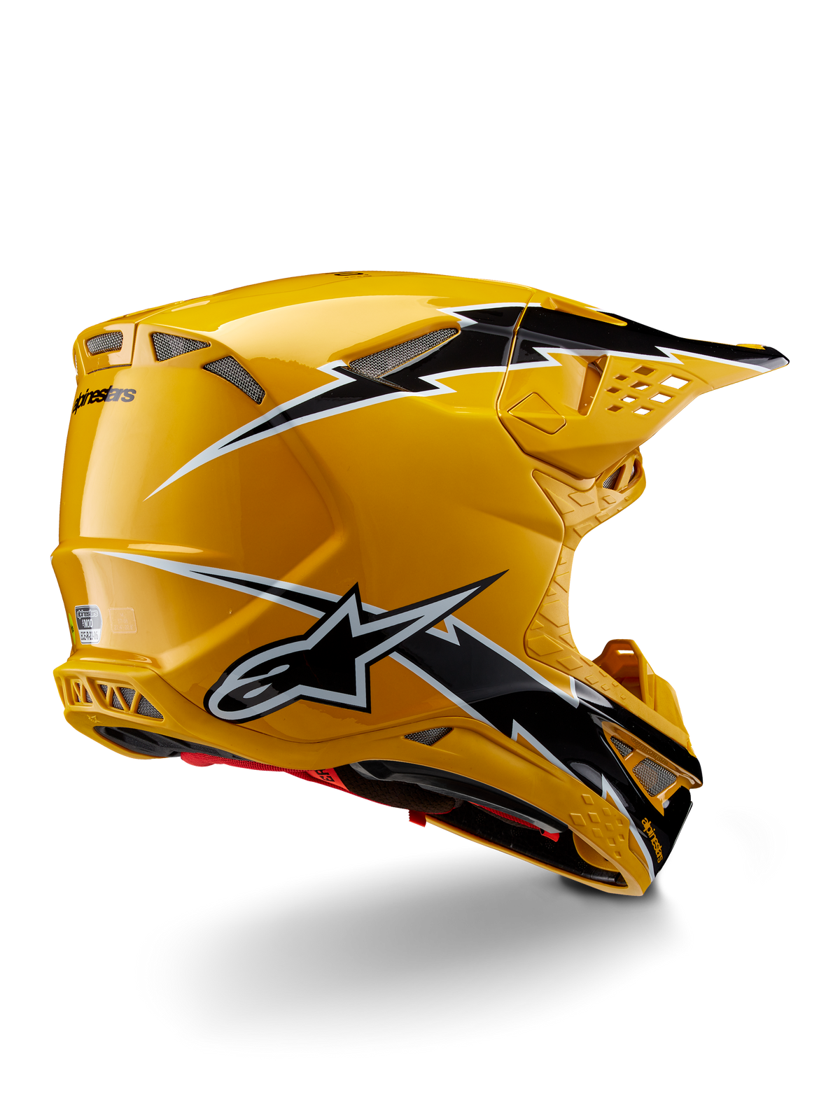 Alpinestars Supertech M10 Ampress hjelm, motocrosshjelm, blank sort og gul, højglans gul finish med sort og hvid grafik i lyn-stil, set bagfra i trekvart profil med aerodynamisk skal og integrerede ventilationsporte
