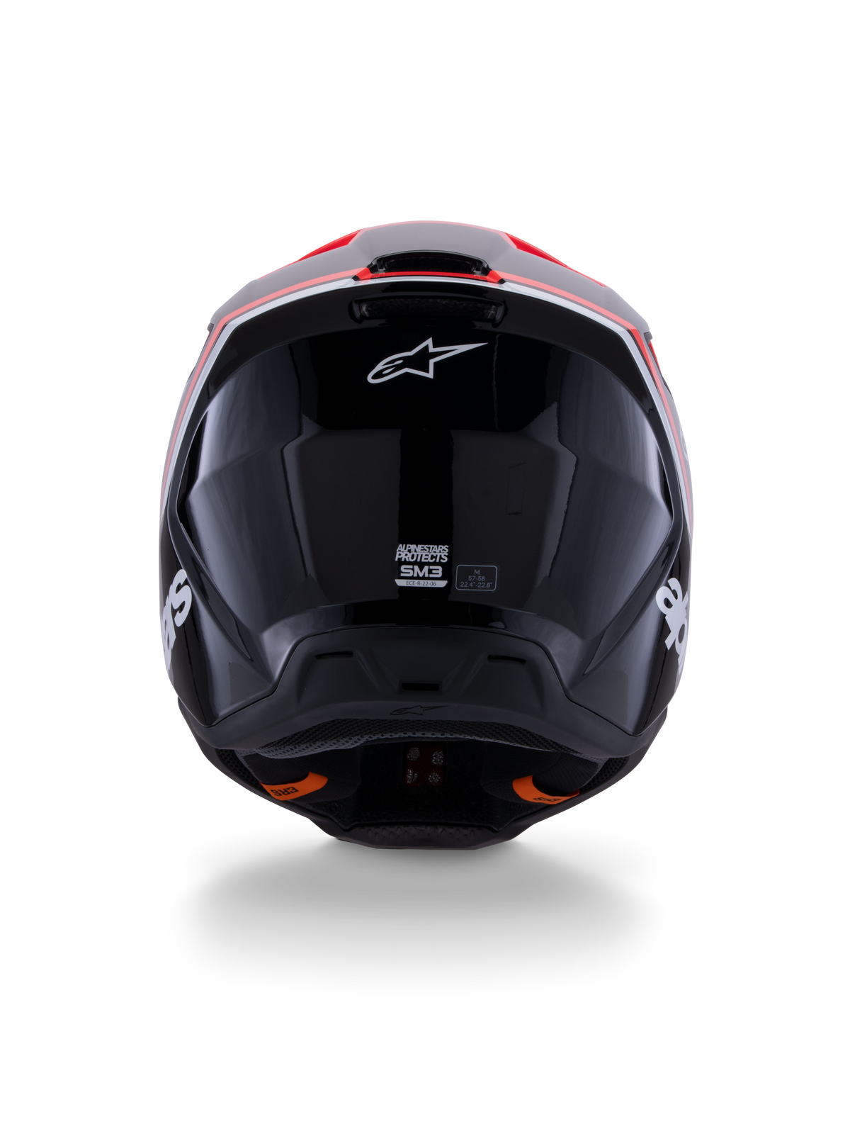 Alpinestars S-M3 Radium hjelm ECE 22.06, motocross-hjelm, blank sort med fluorød og hvide detaljer, set bagfra der viser det aerodynamiske skaldesign, hvidt stjernelogo og certificeringsmærkater.