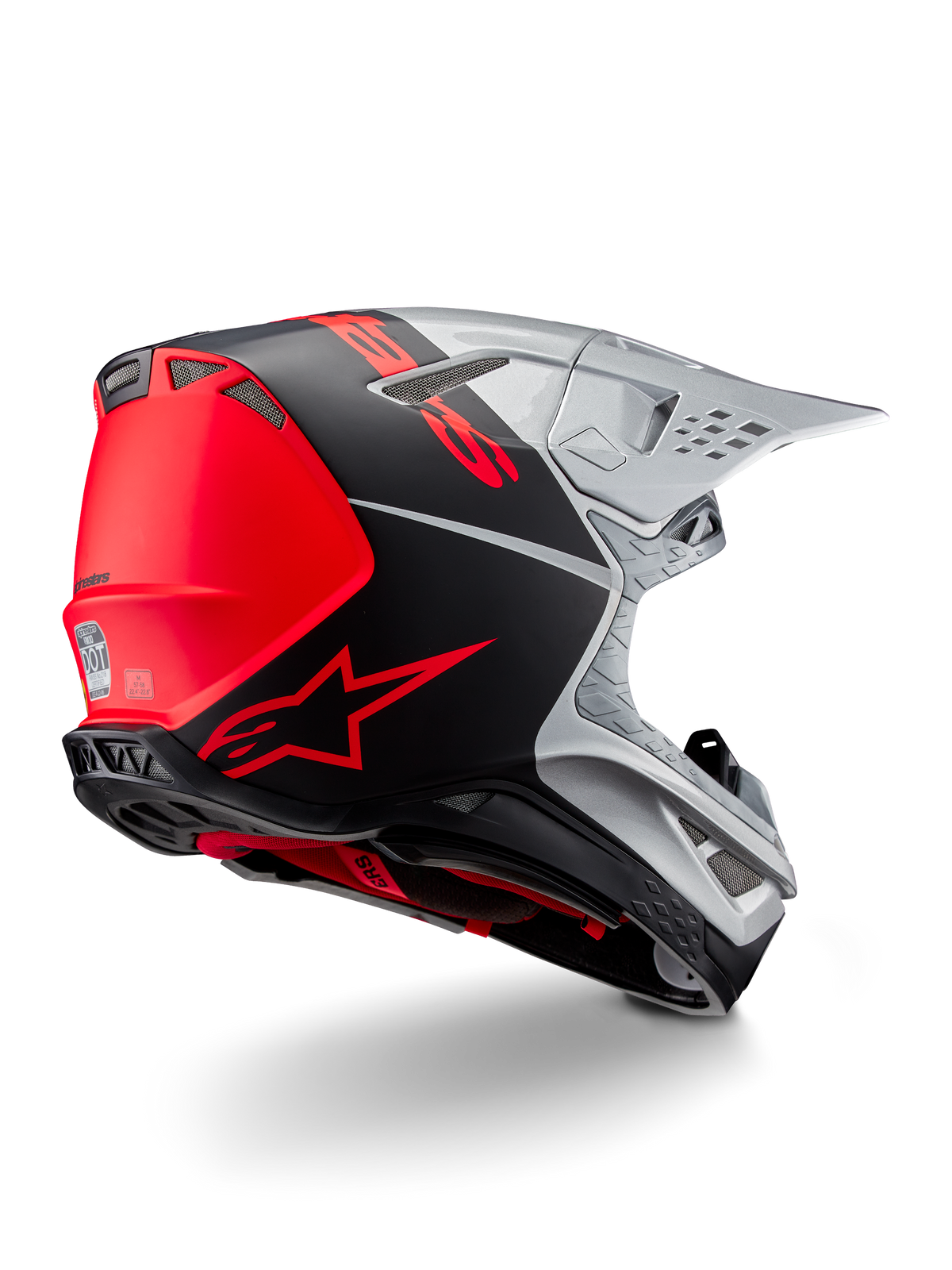 Alpinestars Supertech M10 Flood ECE 22.06 hjelm, motocross-hjelm, sølv, sort og orange fluo, set bagfra fra siden, der fremhæver det aerodynamiske skaldesign, ventilationsåbninger og mat-blank finish