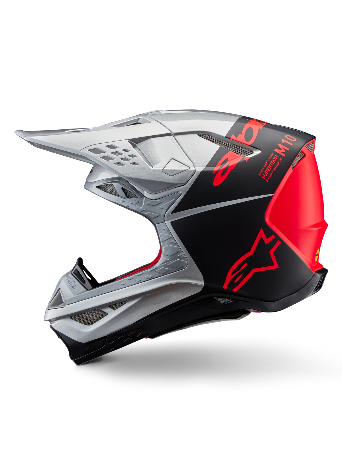 Alpinestars Supertech M10 Flood-hjelm, motocross-hjelm, sølv og sort med fluorescerende orange detaljer, sideprofil, strømlinet aerodynamisk design med ventilationsåbninger, mat og blank finish, professionel off-road racing-beskyttelse