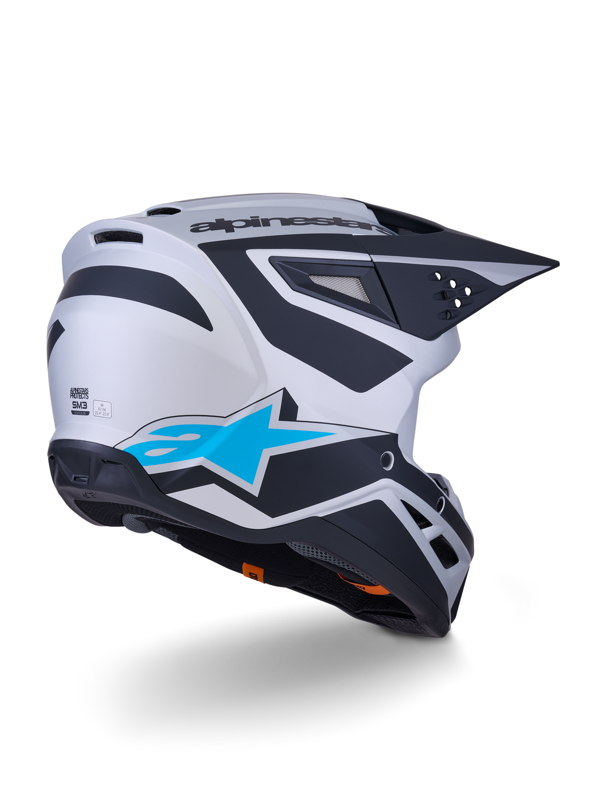 Alpinestars S-M3 Heat Helmet ECE 22.06, Motocross Helmet, Silver Blue and Black Matt, rear-view featuring large blue star logo and black angular designs, aerodynamic shell with ventilation ports, high-performance off-road racing protection
