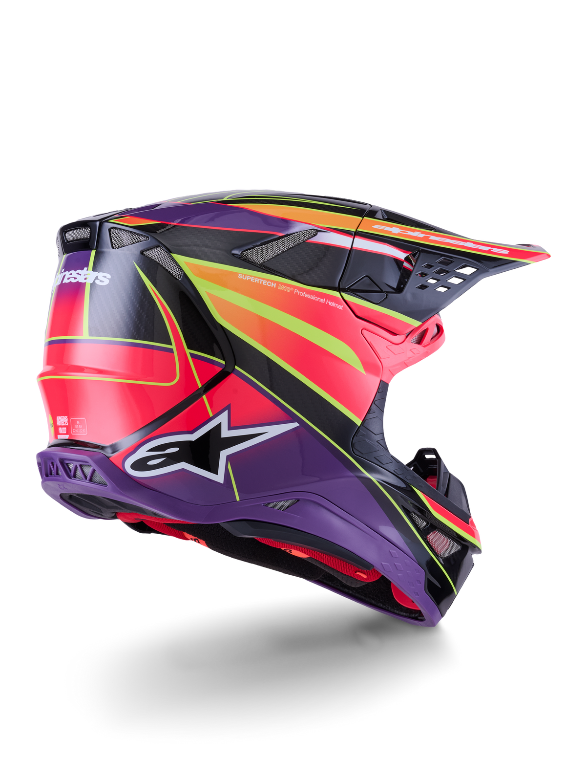 Alpinestars Supertech M10 Era hjelm, motocross-hjelm, pink, violet og gul fluo glossy, set bagfra i trekvart profil, der viser den aerodynamiske kulfiberskal, integrerede ventilationsåbninger og markant grafisk branding, højtydende off-road racingudstyr