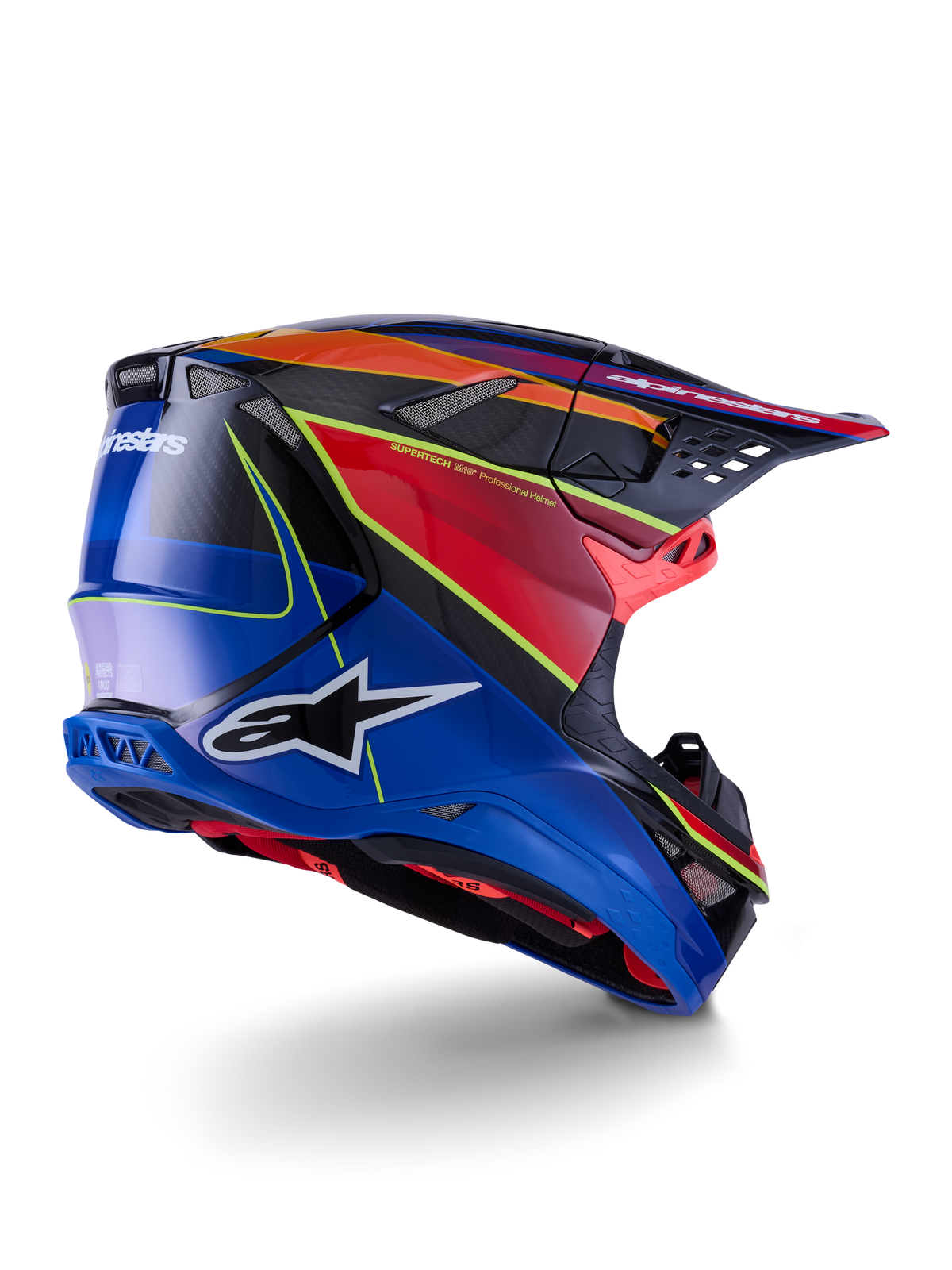 Alpinestars Supertech M10 Era Helmet, Motocross Helmet, Blue Red and Yellow Fluo Glossy, rear-side profile view featuring carbon fiber weave details, bold Alpinestars branding, integrated ventilation ports, and high-gloss finish for off-road performance.