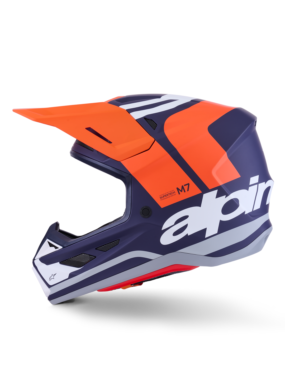 Alpinestars S-M7 Core hjelm ECE 22.06, sideprofil, navyblå og orange mat finish, stort hvidt logo på siden, aerodynamisk motocrosshjelm med beskyttende visir