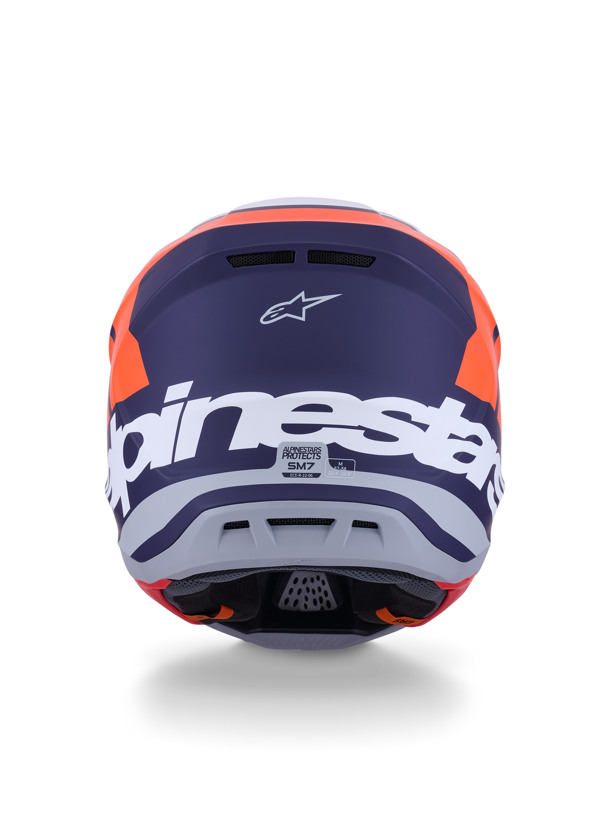 Alpinestars S-M7 Core hjelm ECE 22.06, motocross-hjelm, orange og blå mat, set bagfra med stor hvid Alpinestars-branding og Astars-logo, strømlinet aerodynamisk design med integrerede udluftningsporte, professionel beskyttelse til off-road