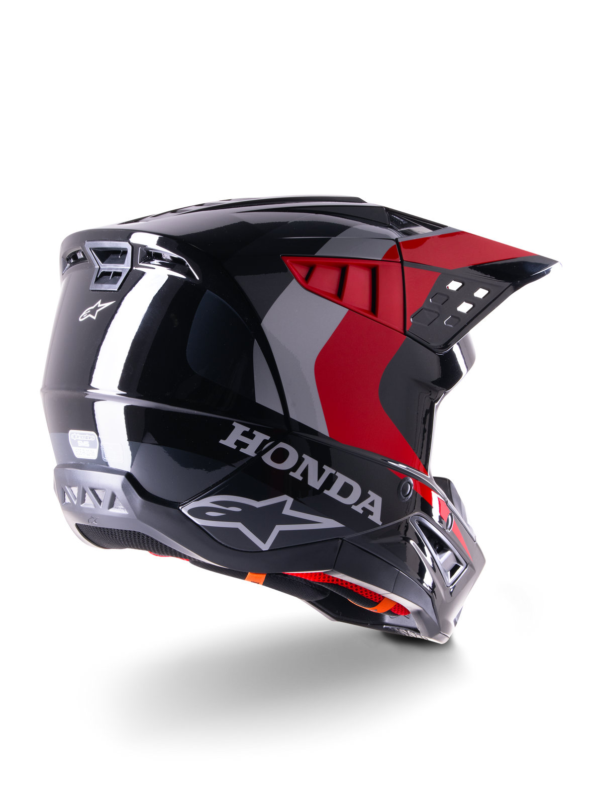 Alpinestars Honda S-M5 ECE-hjelm, motocross-hjelm, blank sort og rød, trekvartvisning bagfra med Honda-branding og Alpinestars-logoer, blank finish med røde og grå grafiske detaljer, designet til off-road-beskyttelse