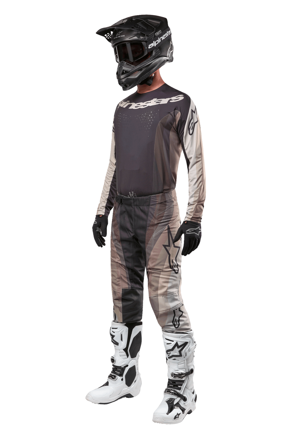 Alpinestars 2024 Techstar Pneuma Pants, Motocross Pants, Dark Sand Iron Dust Gray, worn as part of a complete gear set with matching jersey, black helmet, black gloves, and white boots, featuring tonal desert camo patterns with large logo accents
